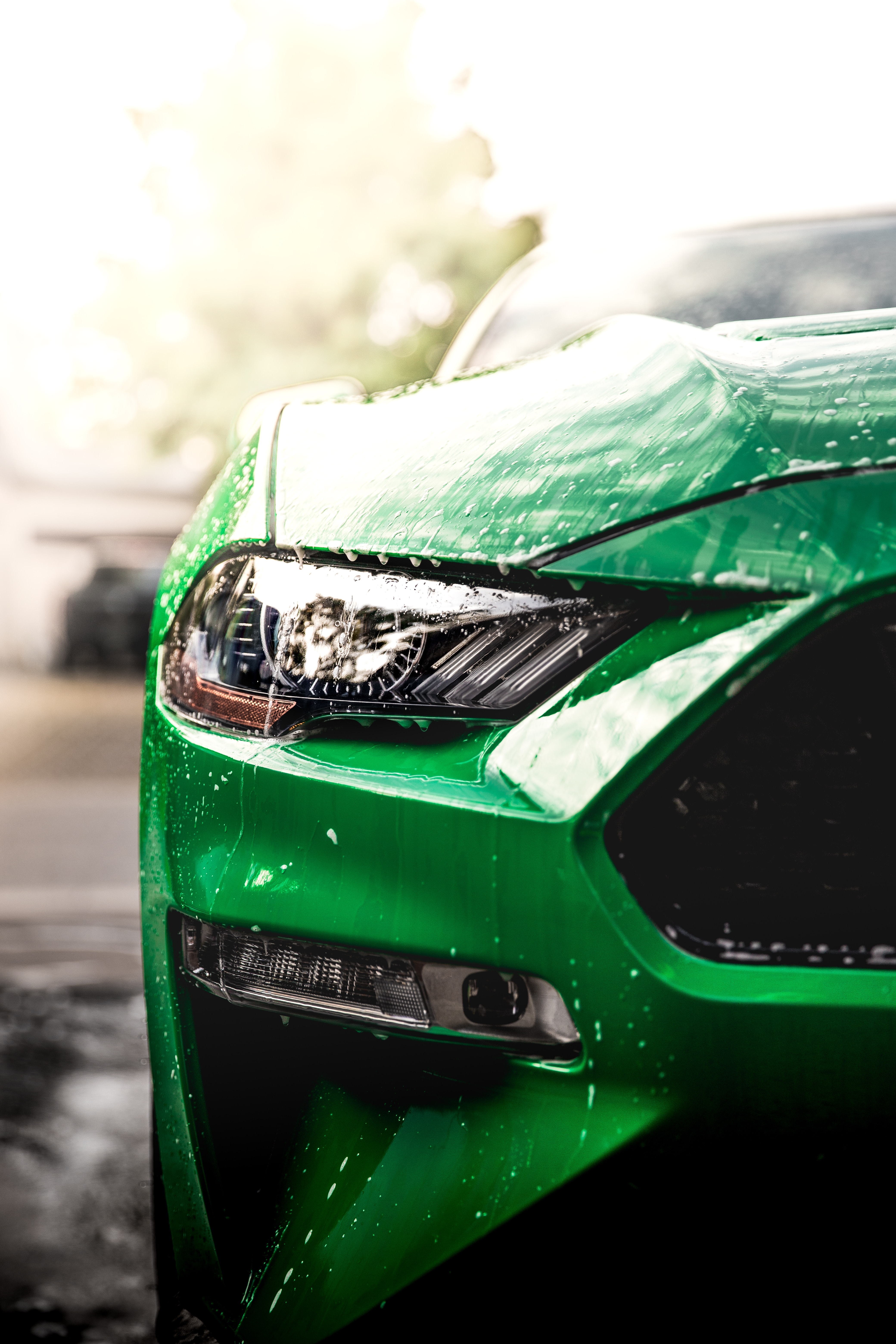 cars, front view, machine, headlight, green, wet, car HD wallpaper