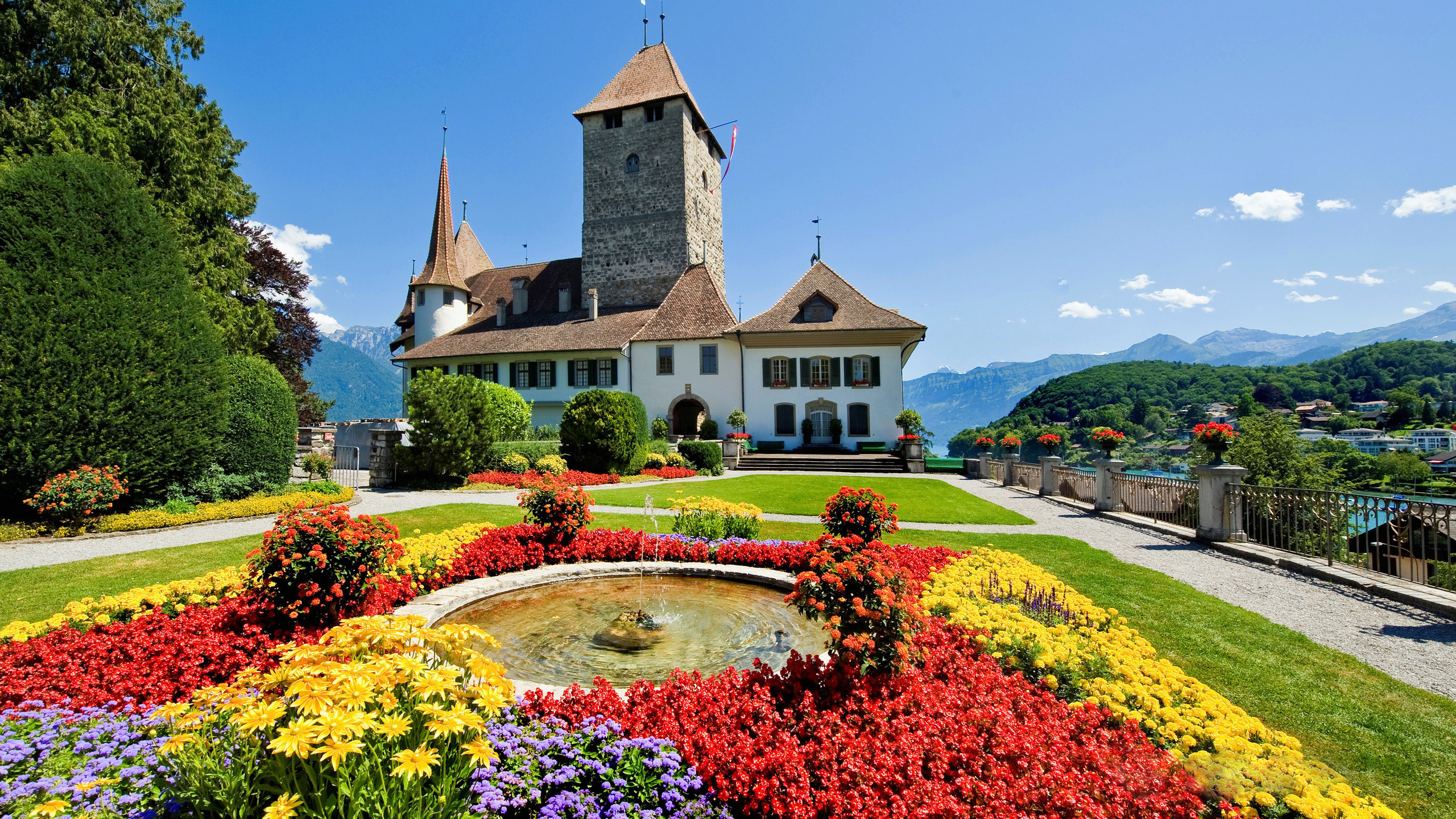 375131 descargar imagen suiza, hecho por el hombre, castillo, edificio, flor, fuente, jardín, castillos: fondos de pantalla y protectores de pantalla gratis