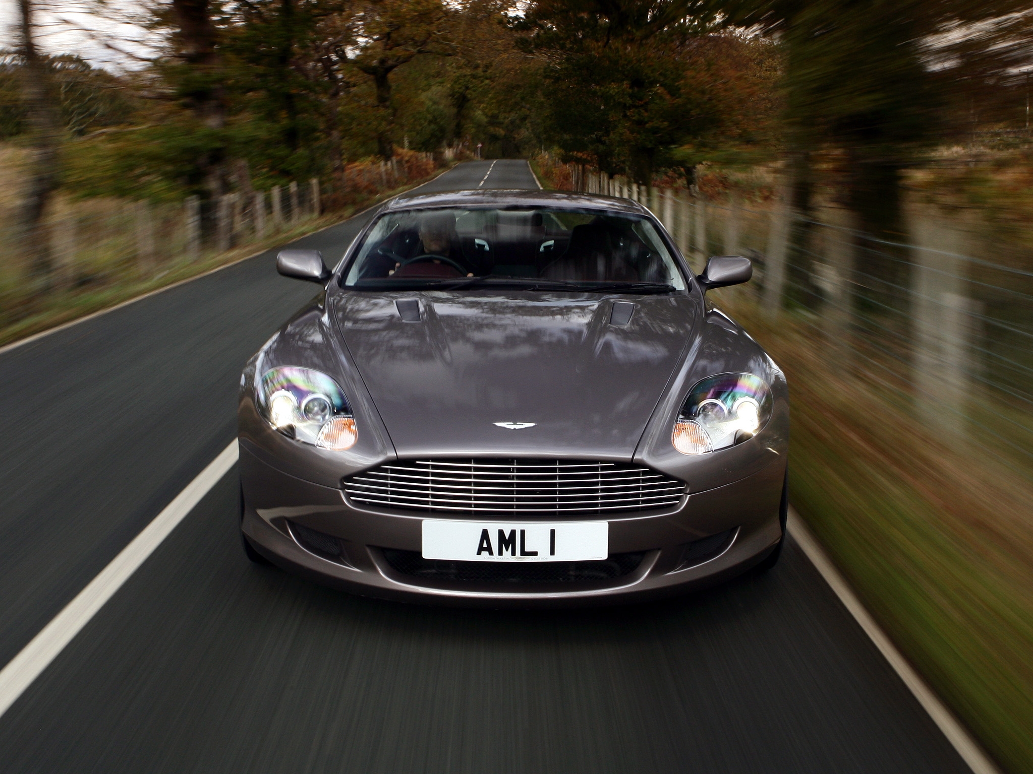 Free download wallpaper Auto, Trees, Grass, Speed, 2004, Db9, Nature, Aston Martin, Cars, Front View, Style, Grey on your PC desktop