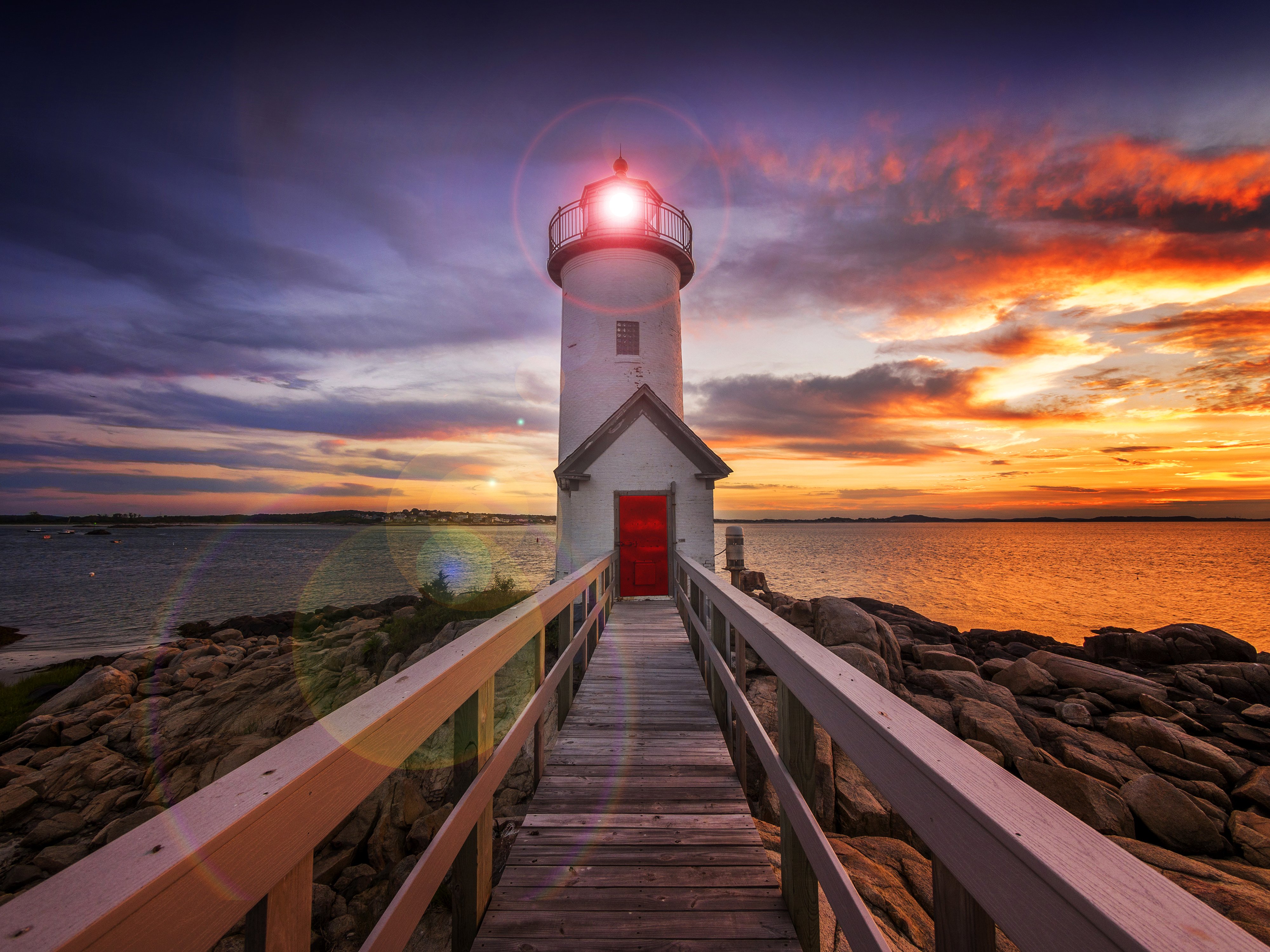 Download mobile wallpaper Sunset, Sky, Wood, Lighthouse, Man Made for free.