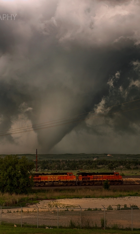 Download mobile wallpaper Earth, Storm, Train, Texas, Railroad, Tornado for free.