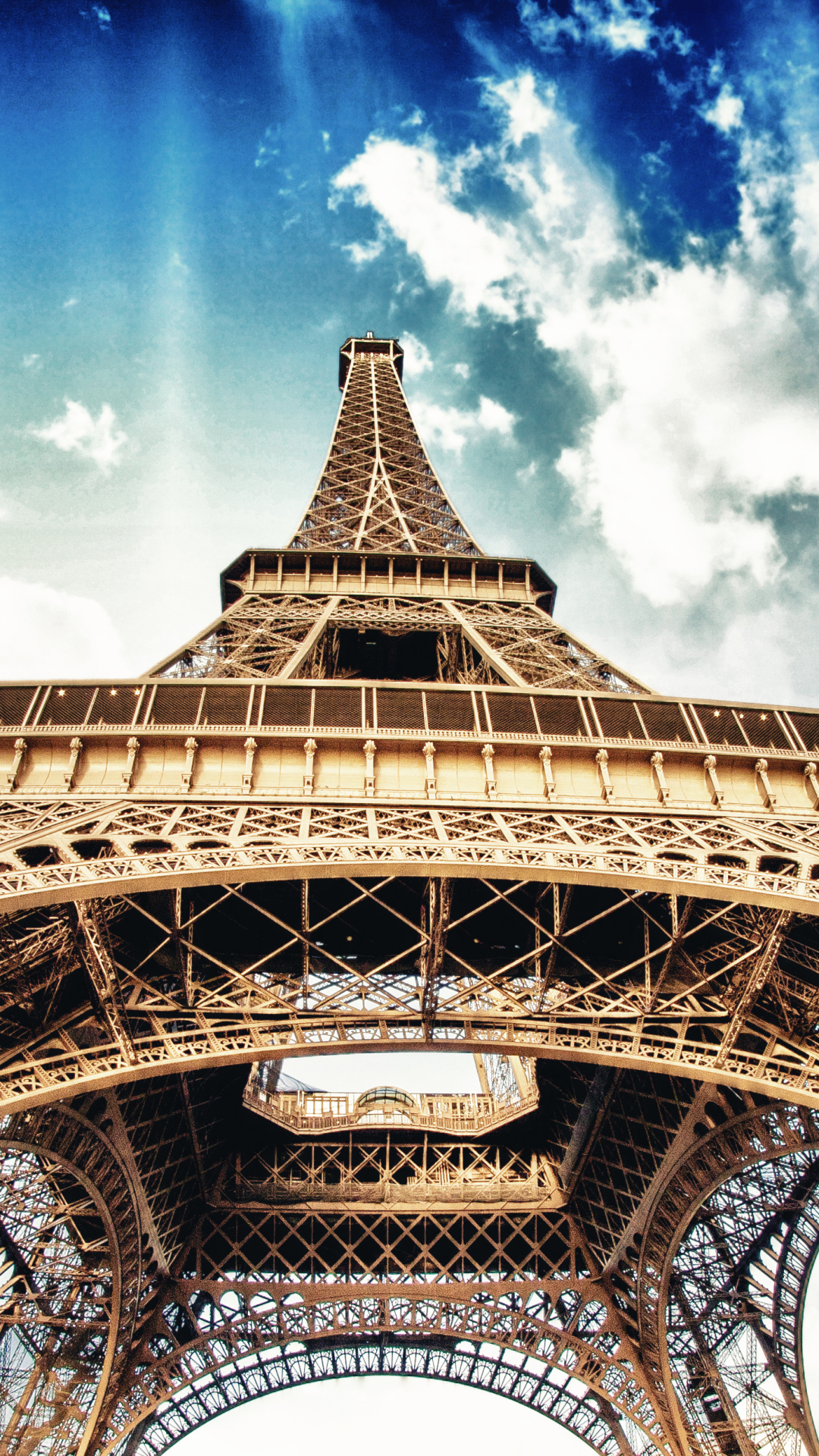 Download mobile wallpaper Sky, Paris, Eiffel Tower, Monuments, France, Cloud, Monument, Sunbeam, Man Made, Sunbean for free.