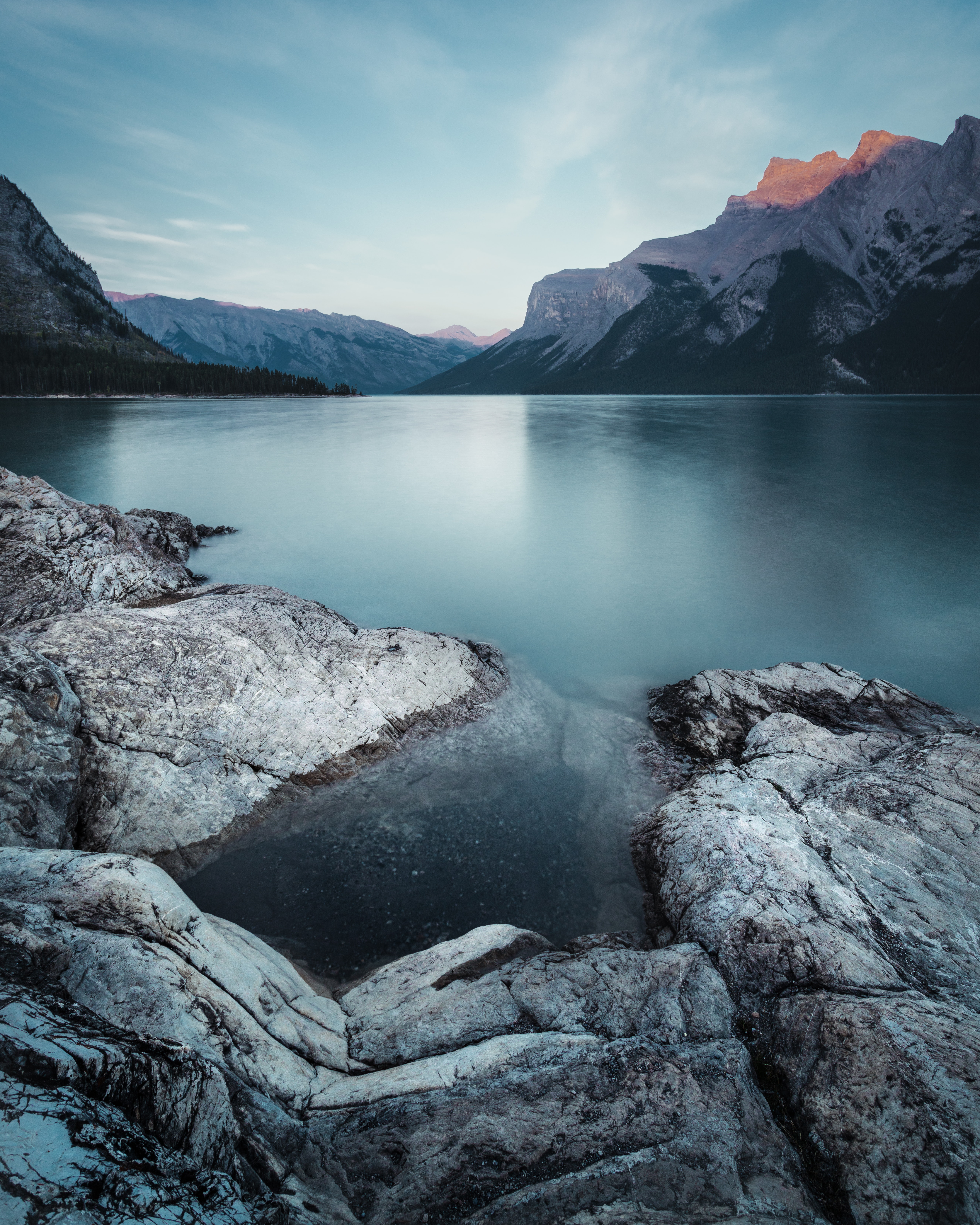 Download mobile wallpaper Wildlife, Mountains, Stones, Lake, Sky, Nature, Landscape for free.