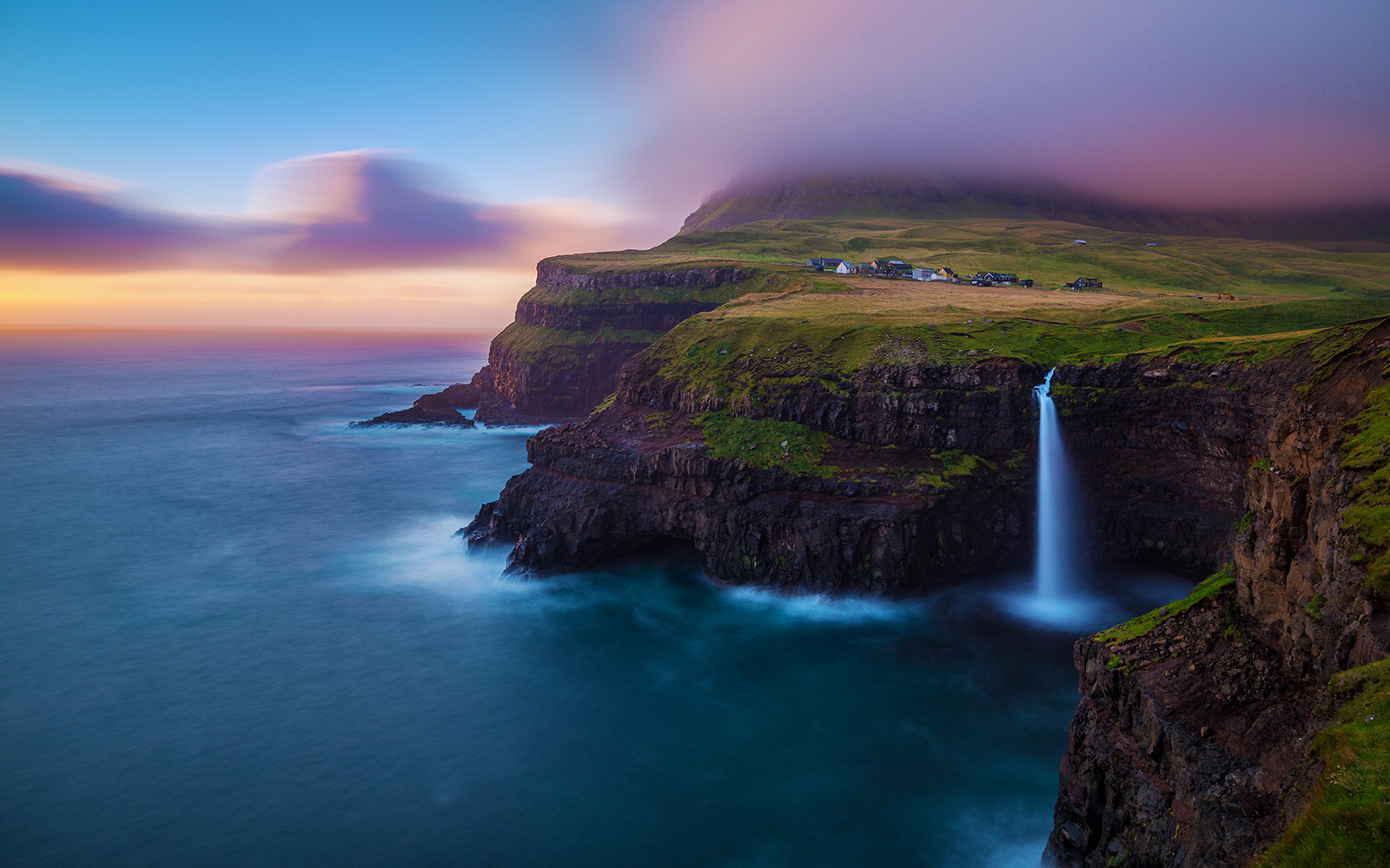 Free download wallpaper Sunset, Waterfall, Earth, Cliff, Man Made, Gásadalur on your PC desktop