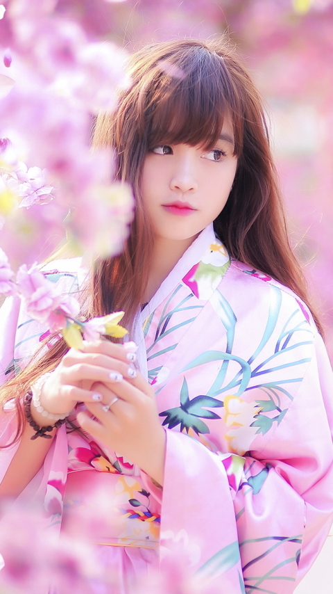 Download mobile wallpaper Blur, Kimono, Petal, Brunette, Model, Women, Blossom, Asian, Brown Eyes, Pink Flower for free.