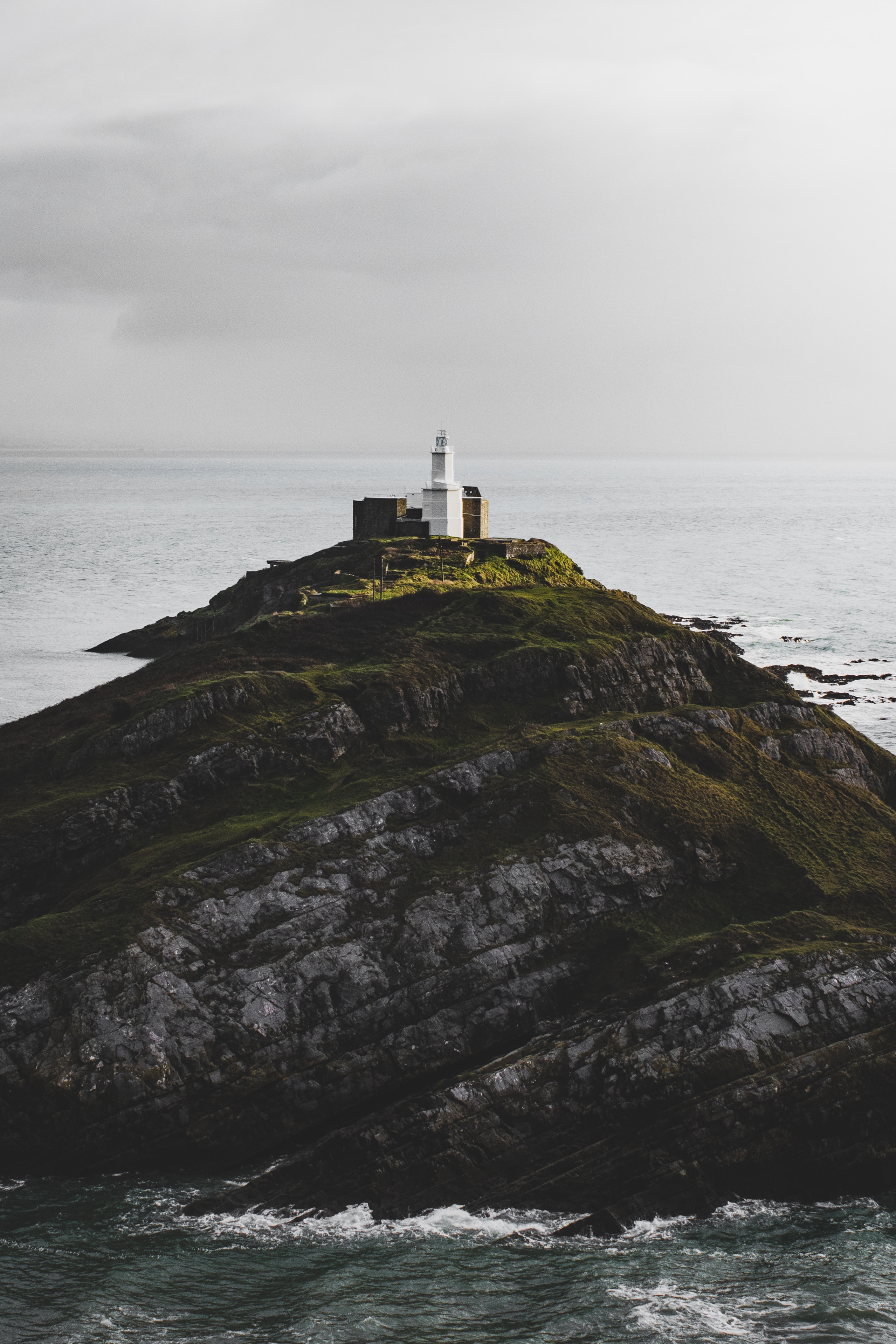 Free download wallpaper Rock, Coast, Hill, Nature, Lighthouse, Sea on your PC desktop