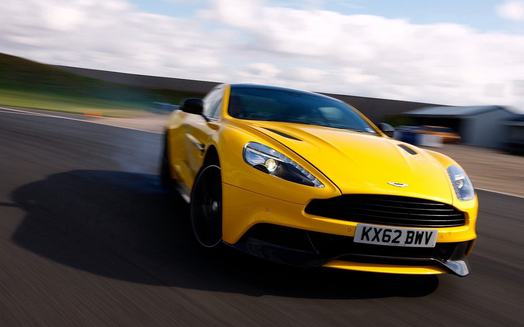 cars, yellow, aston martin, road, blur, smooth, speed, supercar, front end, limber