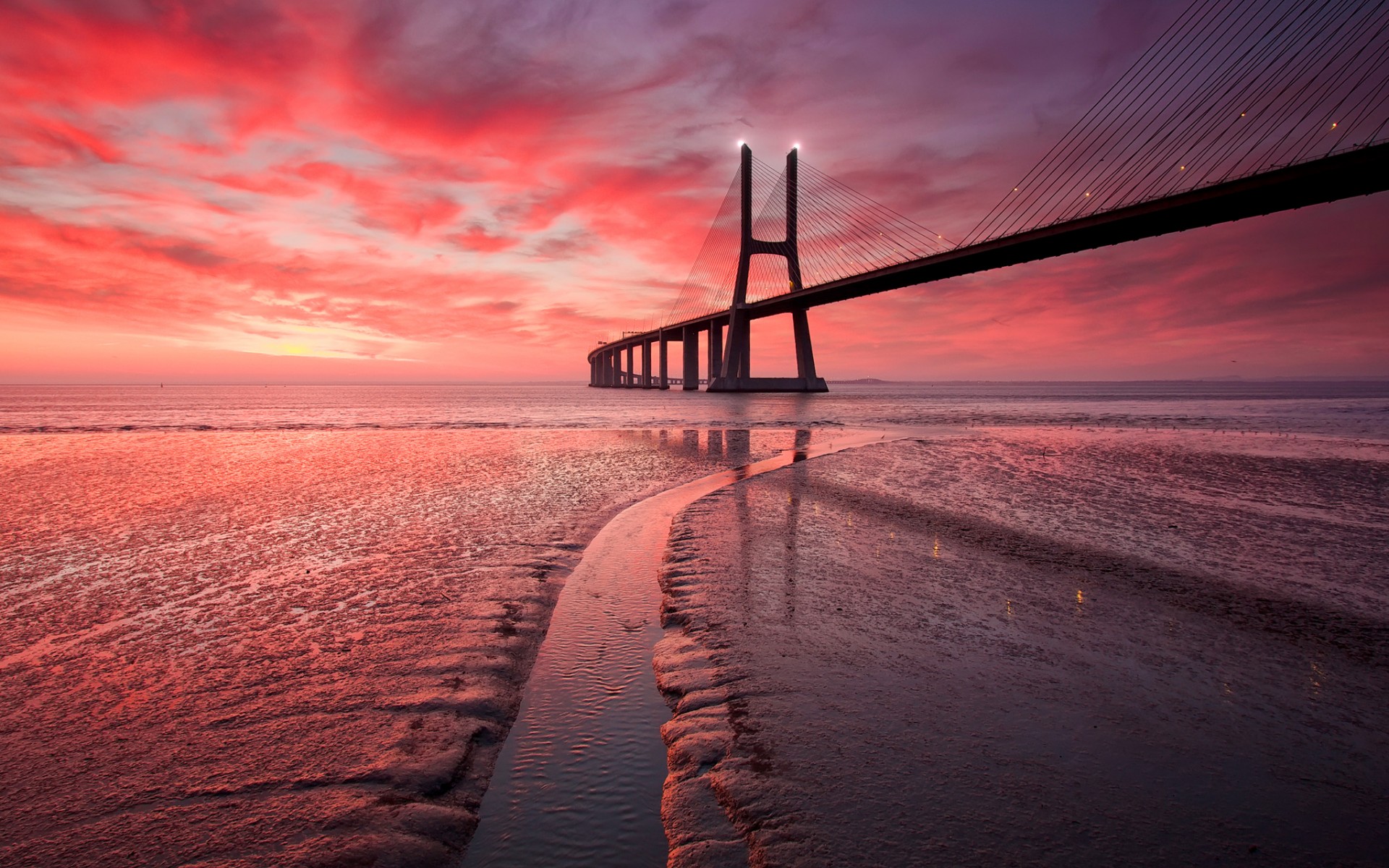 Download mobile wallpaper Bridges, Sunset, Sky, Sea, Pink, Horizon, Ocean, Bridge, Portugal, Man Made, Vasco Da Gama Bridge for free.
