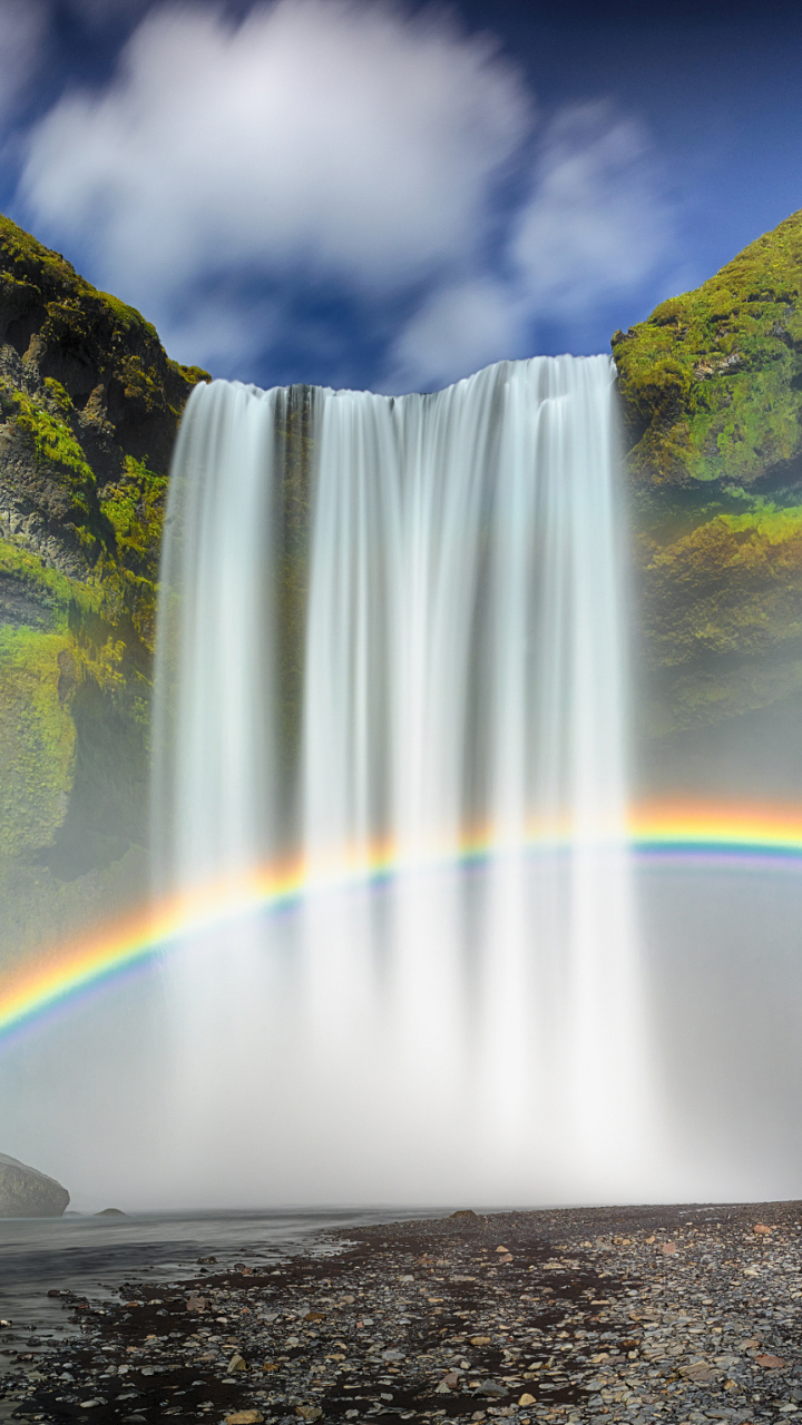 Download mobile wallpaper Waterfalls, Rainbow, Waterfall, Earth, Moss, Skógafoss, Skógafoss Waterfall for free.
