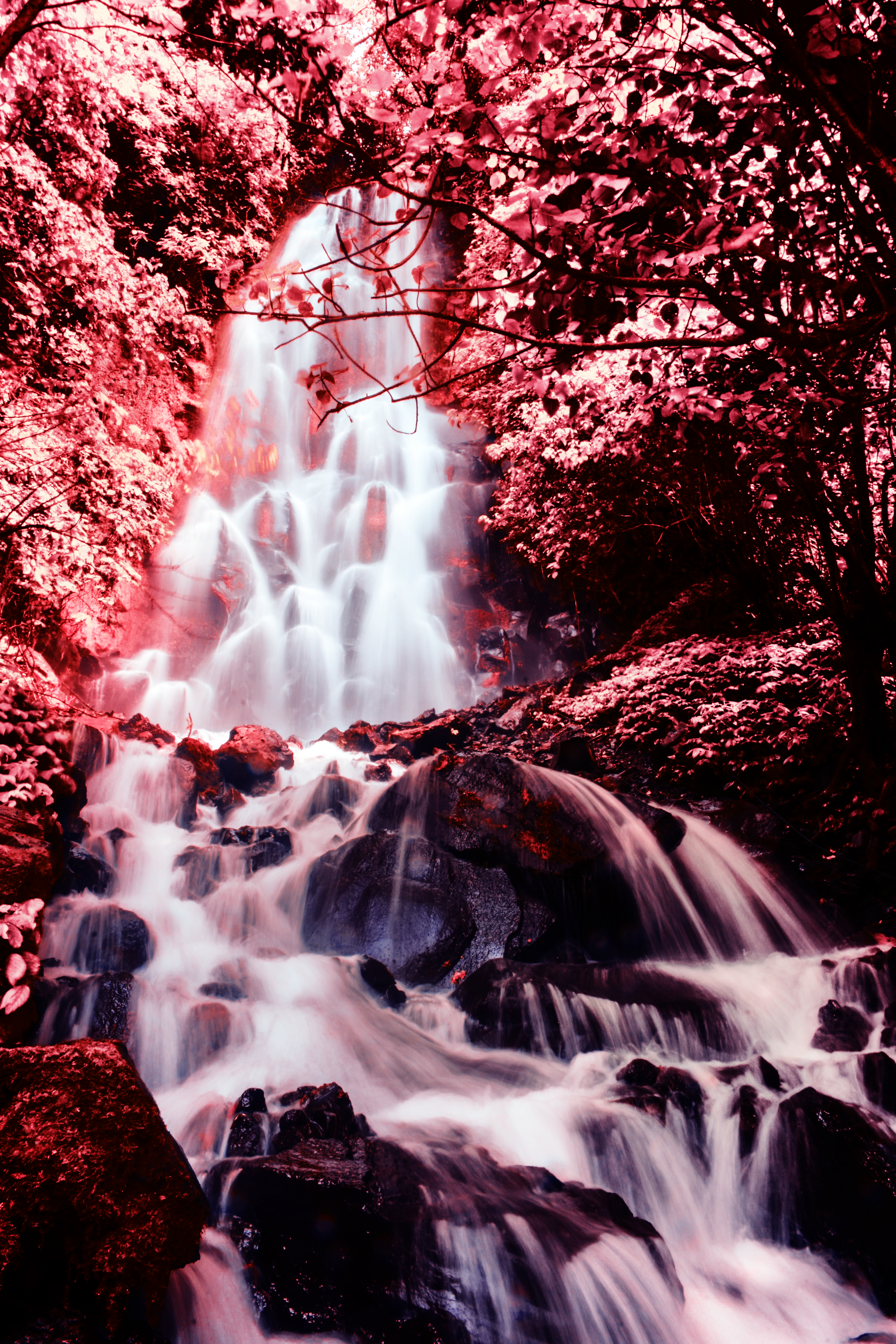 Скачать картинку Водопад, Течение, Камни, Красный, Фотошоп, Природа в телефон бесплатно.