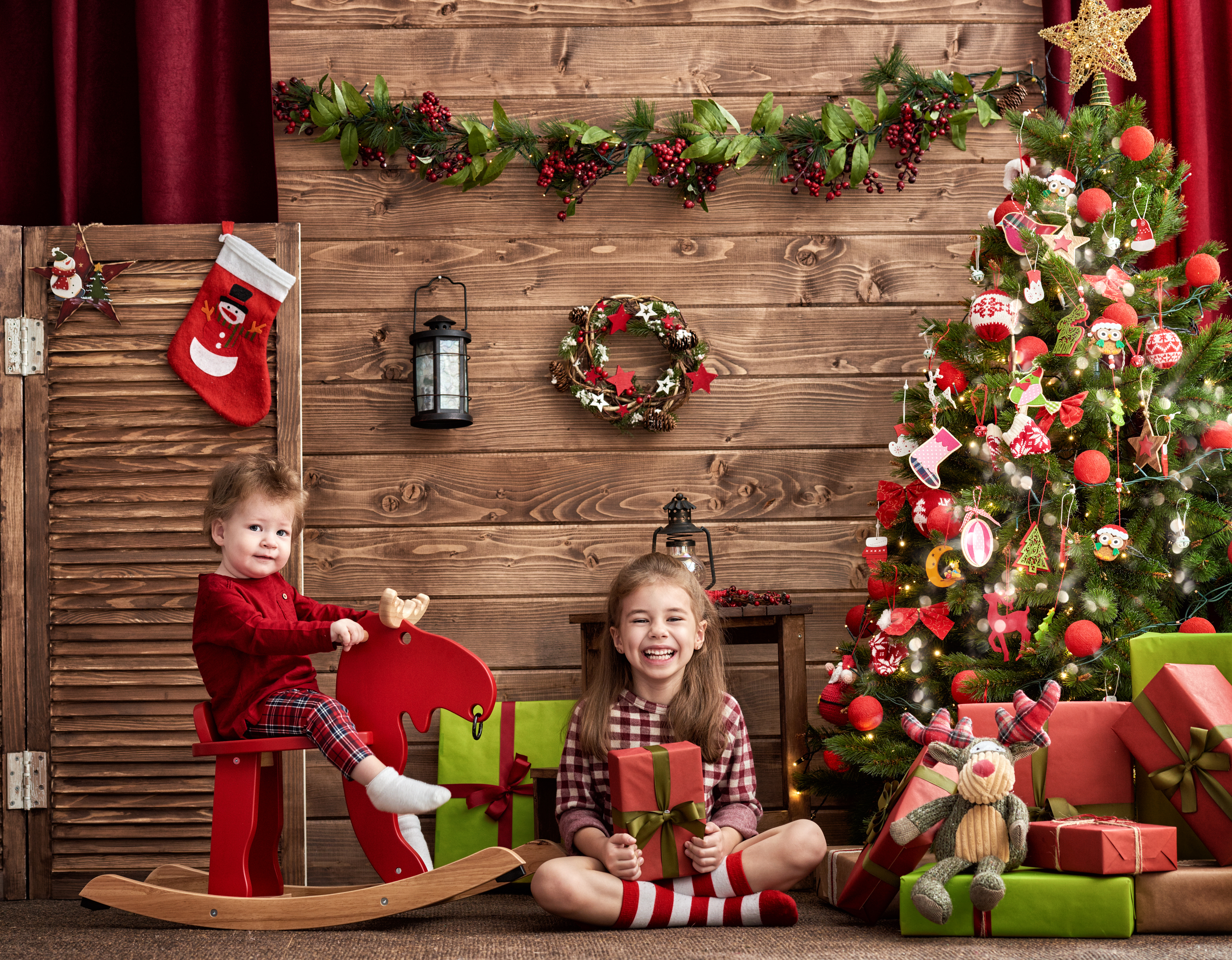 child, holiday, christmas, christmas tree, gift, little boy, little girl, smile, stuffed animal phone wallpaper