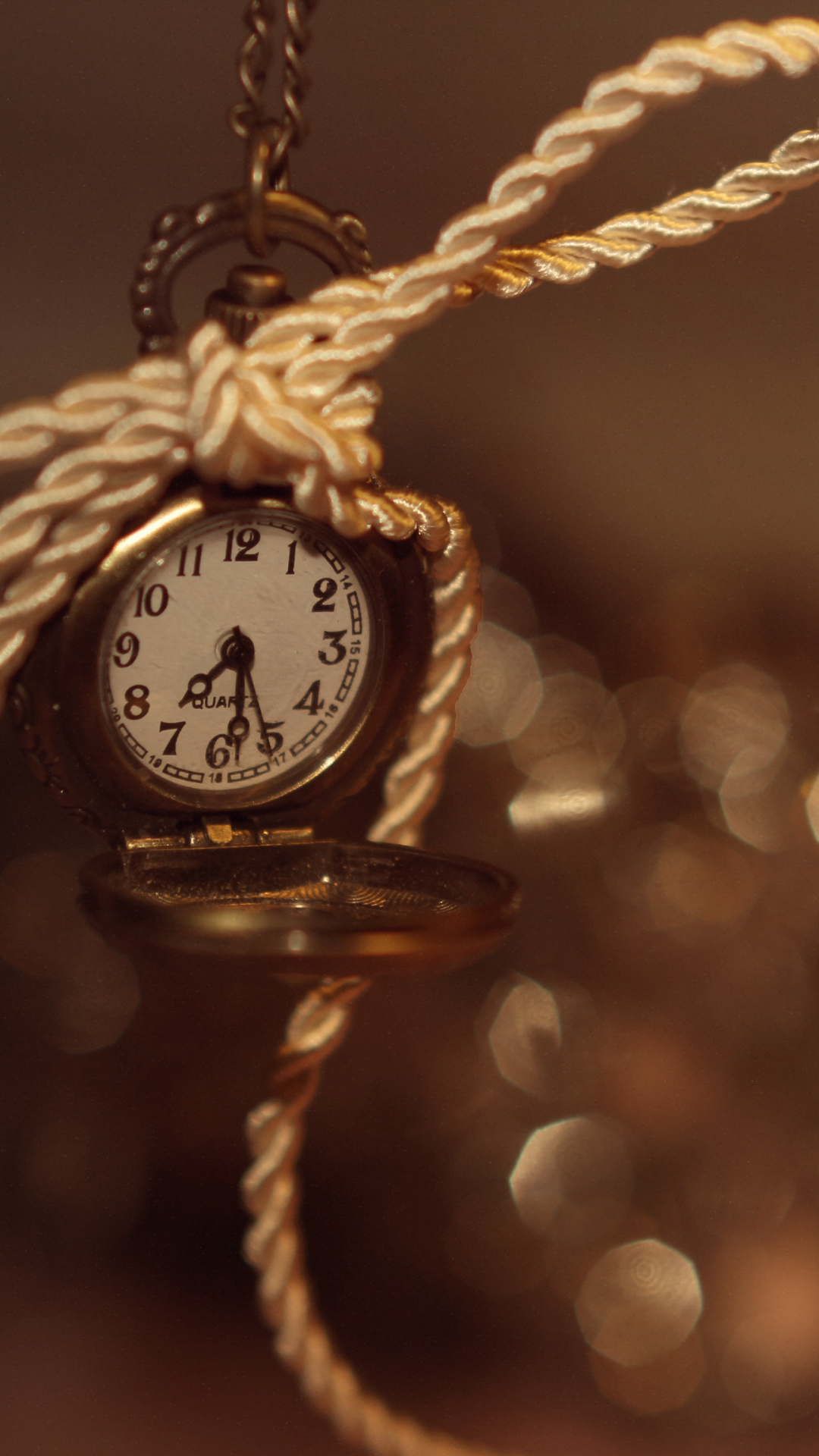 Download mobile wallpaper Golden, Bokeh, Watch, Rope, Man Made for free.