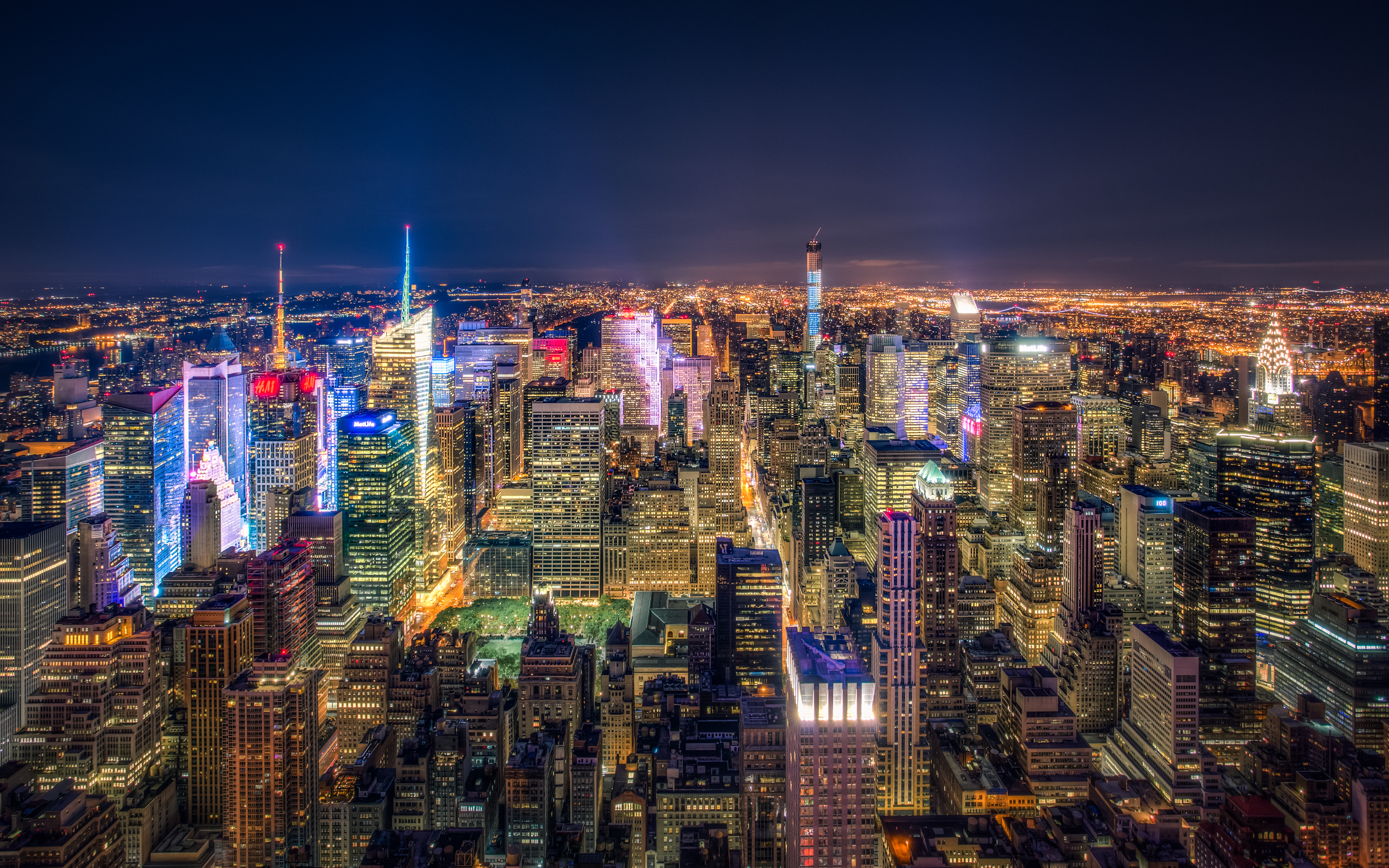 Download mobile wallpaper Cities, Night, City, Skyscraper, Building, Horizon, Light, Cityscape, New York, Aerial, Man Made for free.