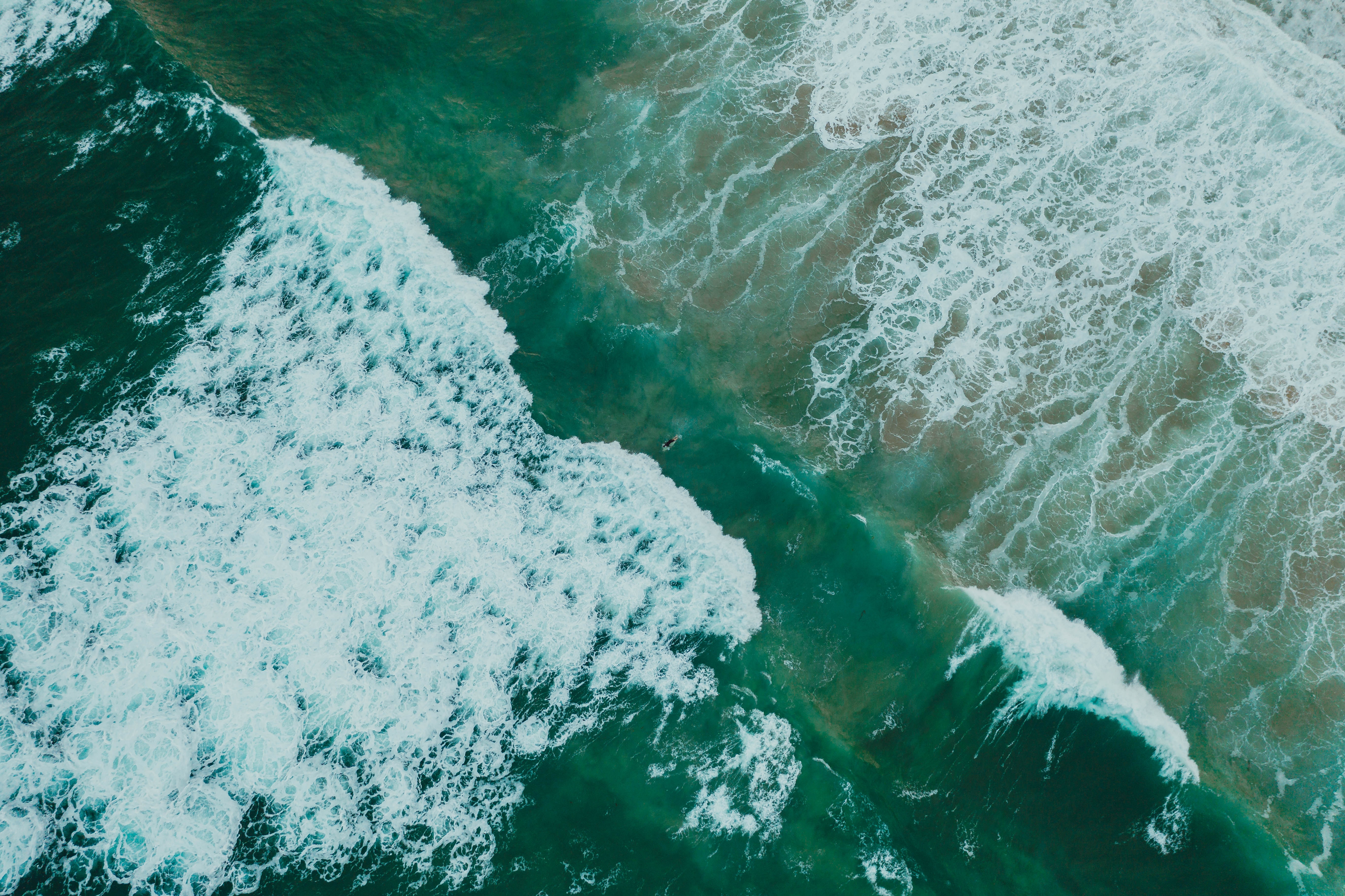 Скачать картинку Океан, Природа, Вид Сверху, Вода, Волны, Поверхность в телефон бесплатно.