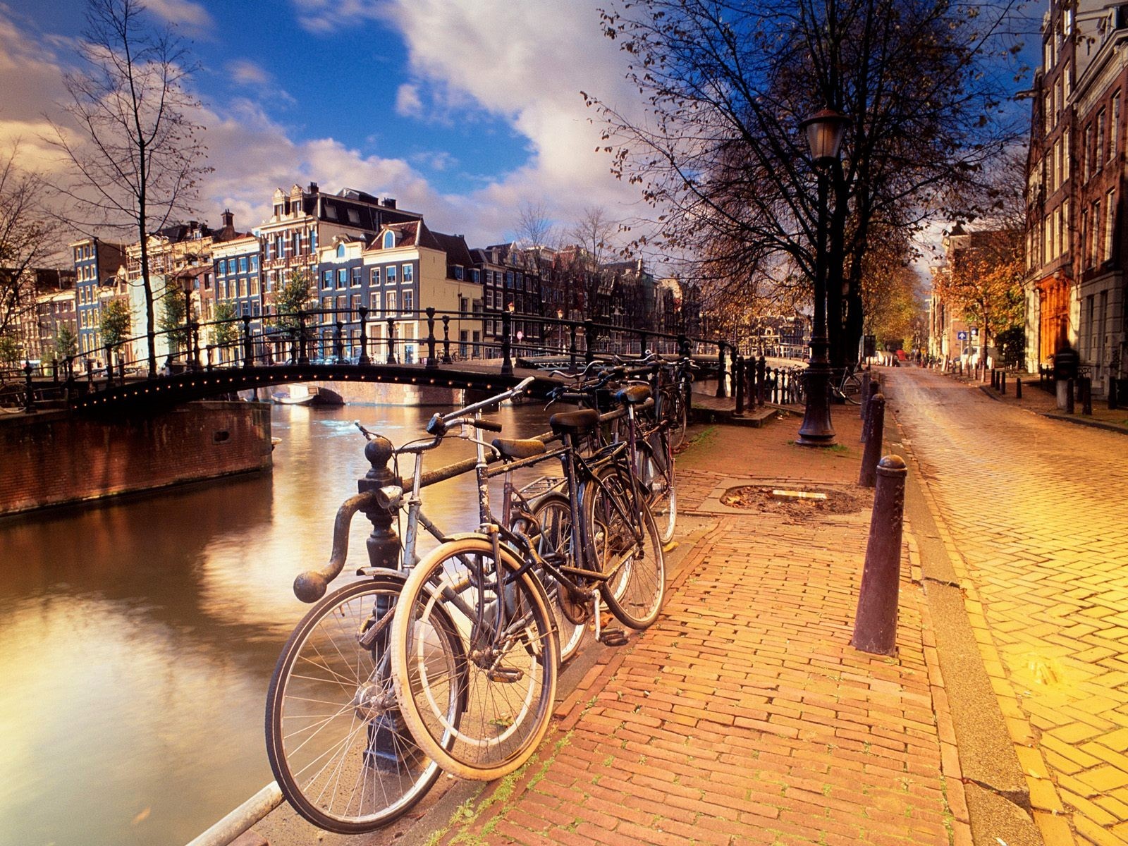 Download mobile wallpaper Cities, City, House, Bicycle, Netherlands, Amsterdam, Man Made, Canal for free.