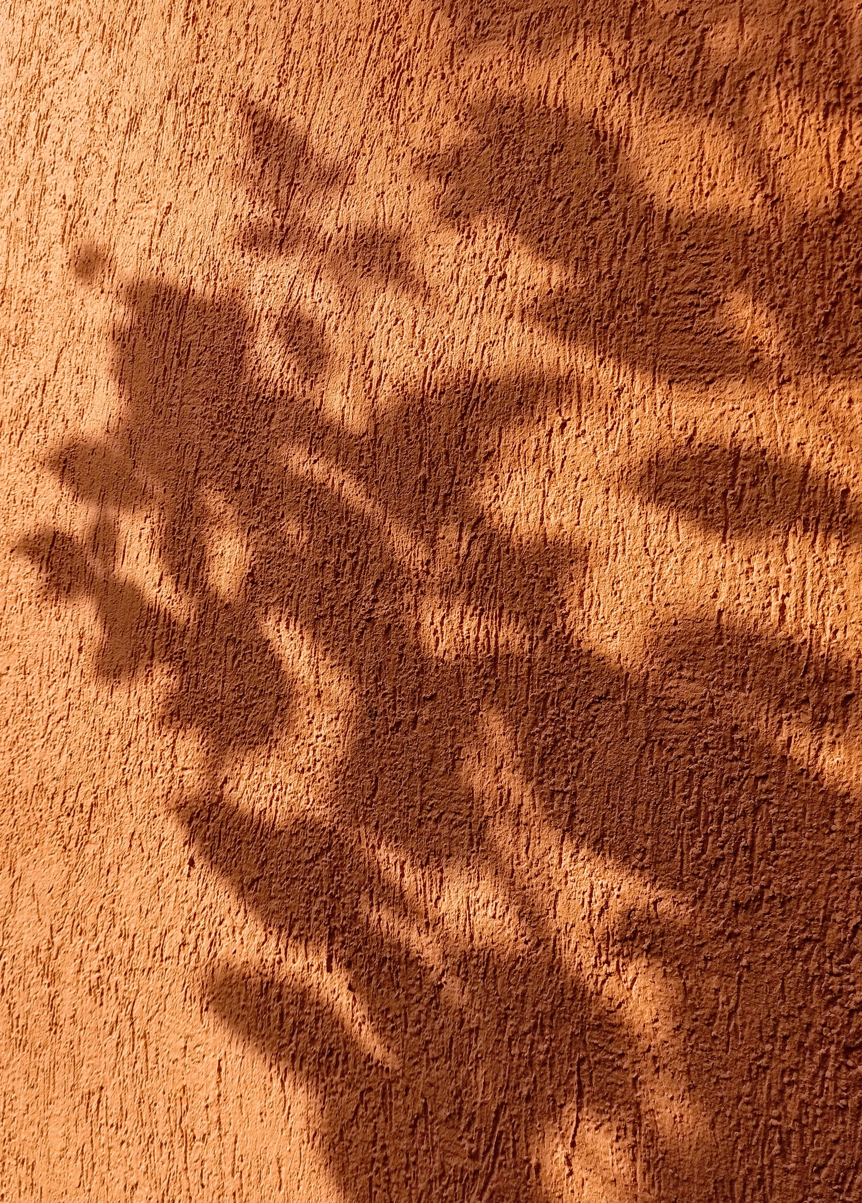 Download mobile wallpaper Shadow, Wall, Texture, Brown, Textures for free.