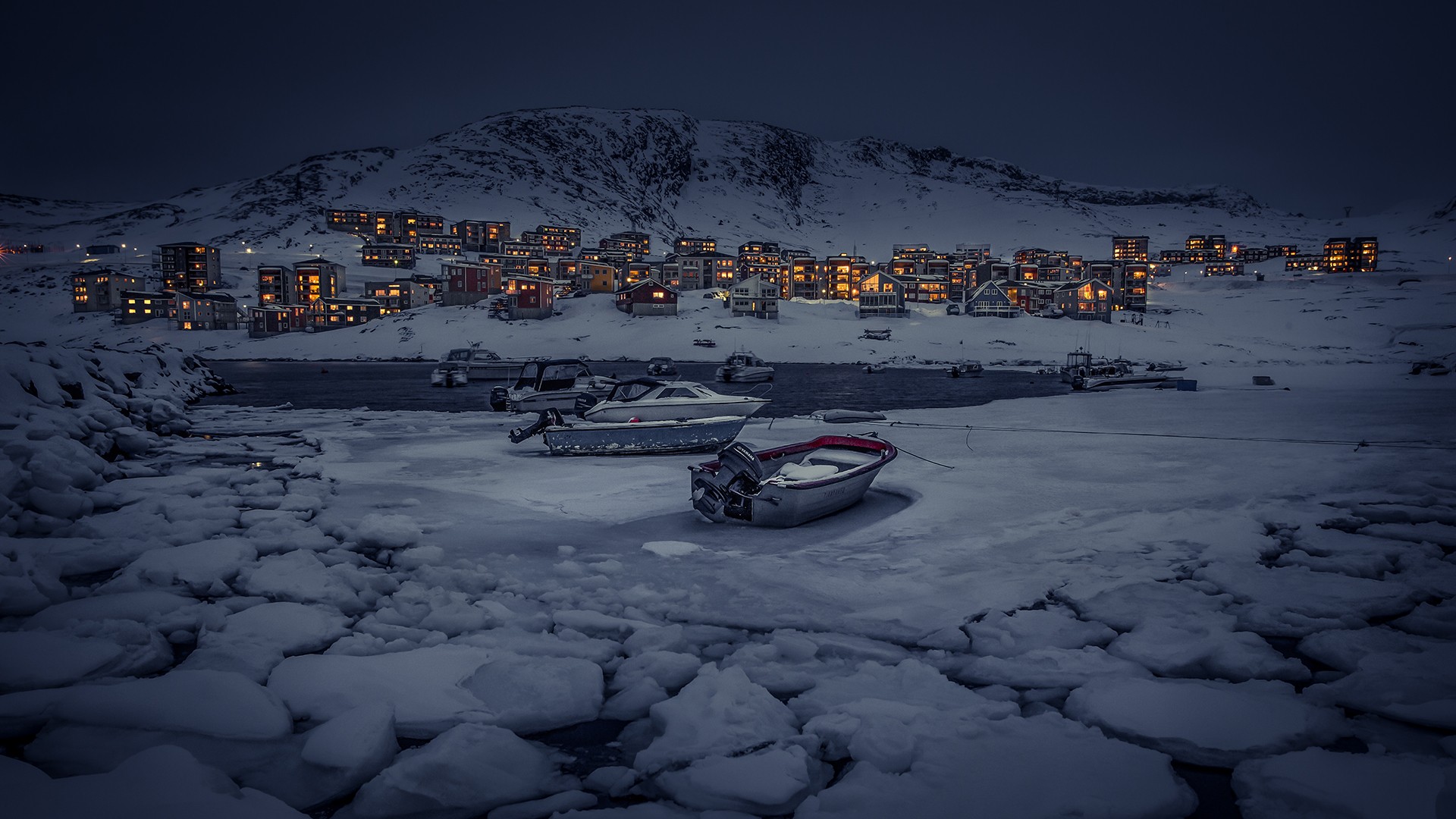 Download mobile wallpaper Winter, Ice, Night, Snow, Light, Village, Boat, Man Made for free.