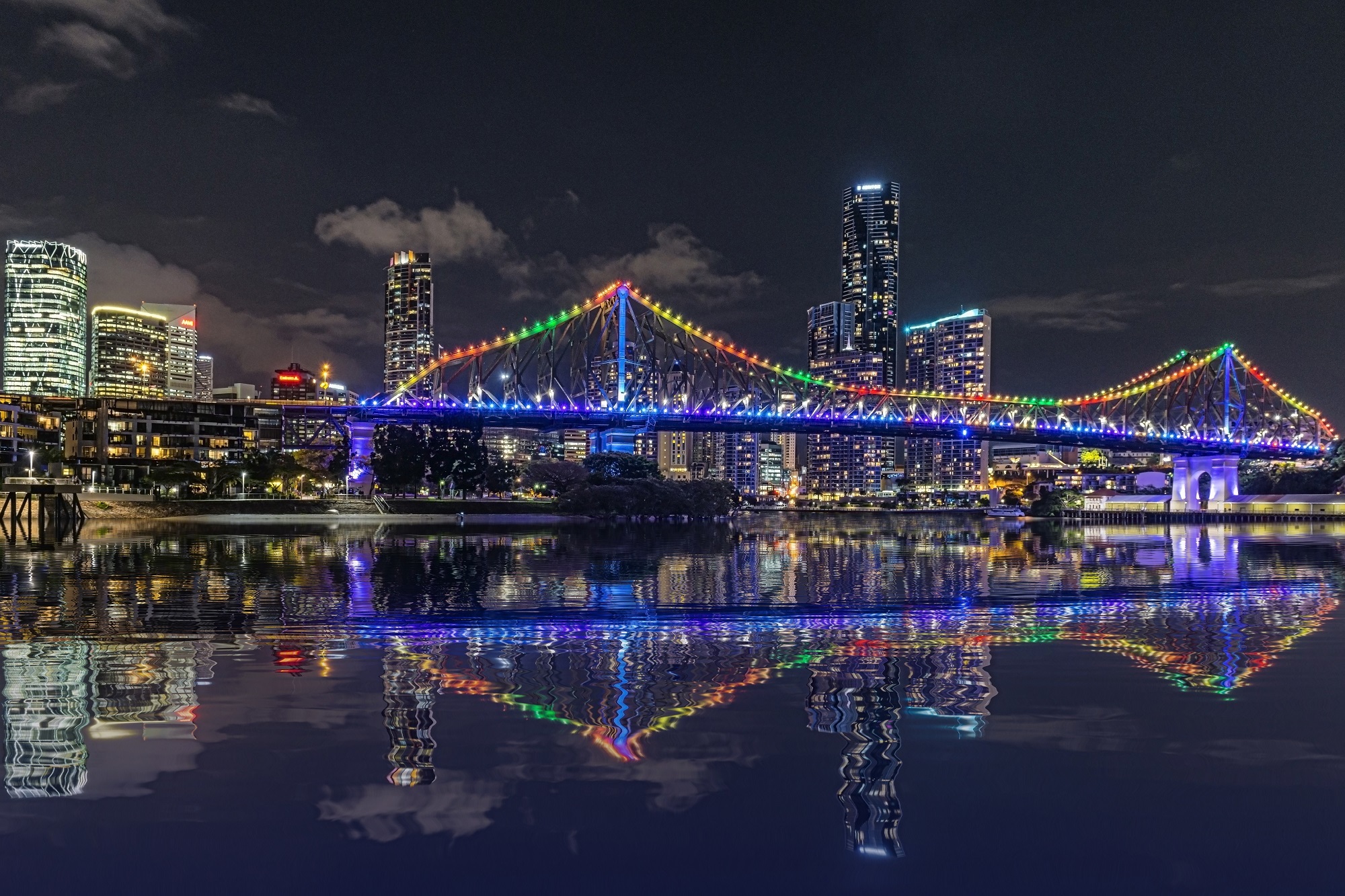 Free download wallpaper Bridges, Night, City, Skyscraper, Reflection, Light, Bridge, Australia, Brisbane, Man Made, Story Bridge on your PC desktop
