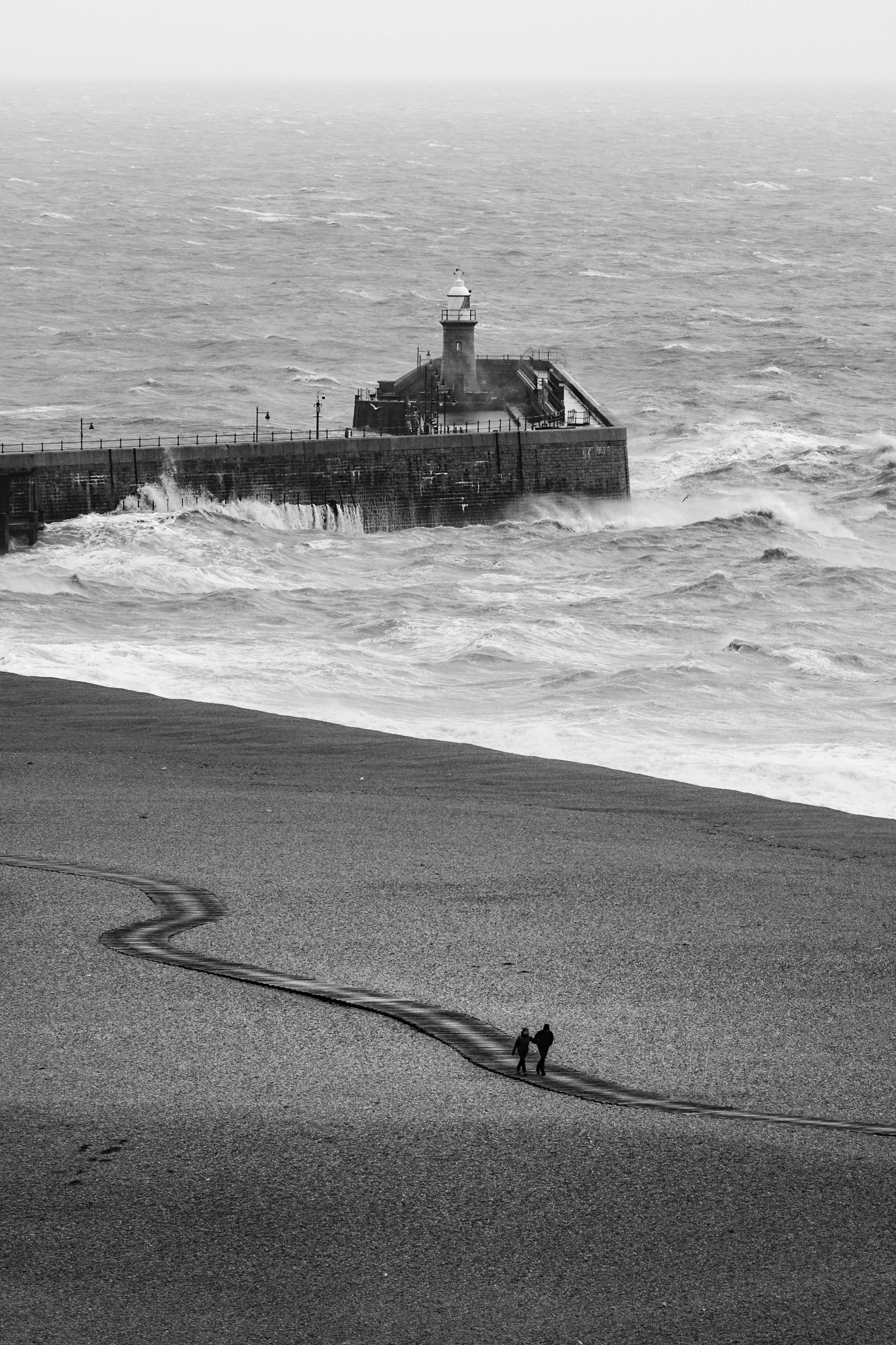 Download mobile wallpaper Miscellanea, Chb, Waves, Miscellaneous, Bw, Lighthouse, Sea for free.