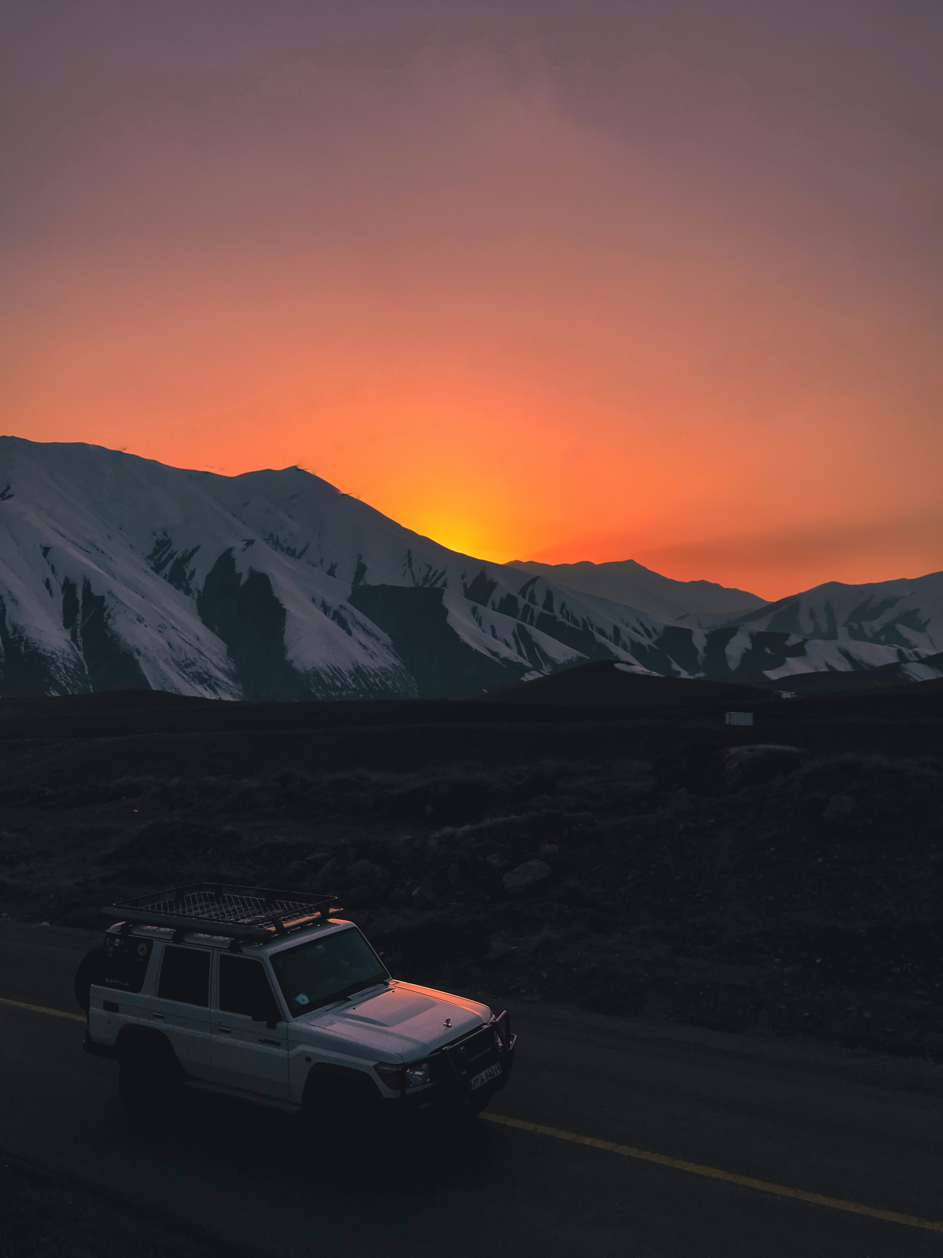 Free download wallpaper Sunset, Macro, Road, Mountains, Car, Suv on your PC desktop