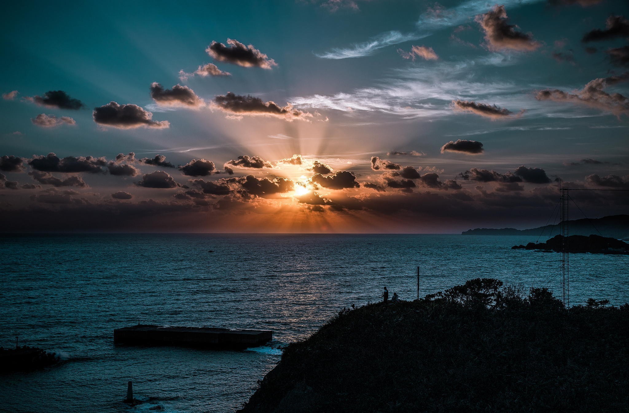 Download mobile wallpaper Sunset, Sea, Earth, Cloud, Sunbeam, Seashore for free.