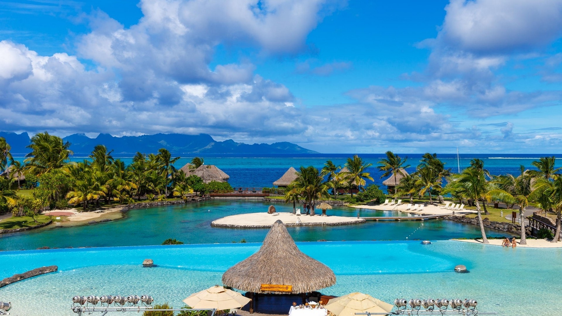 Free download wallpaper Beach, Ocean, Tropical, Hut, Resort, Man Made, Palm Tree on your PC desktop