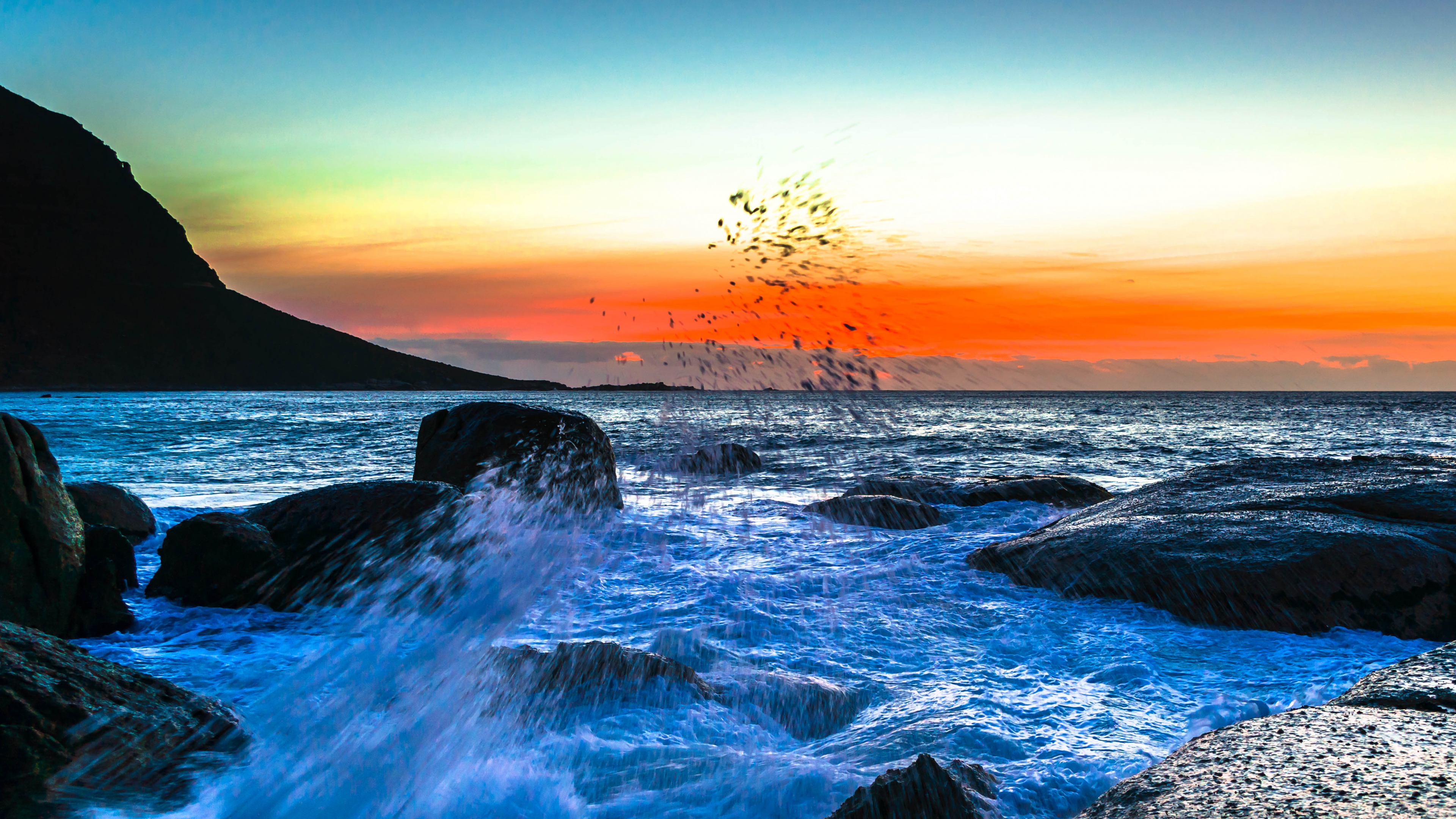 Download mobile wallpaper Sunset, Sea, Ocean, Splash, Earth for free.