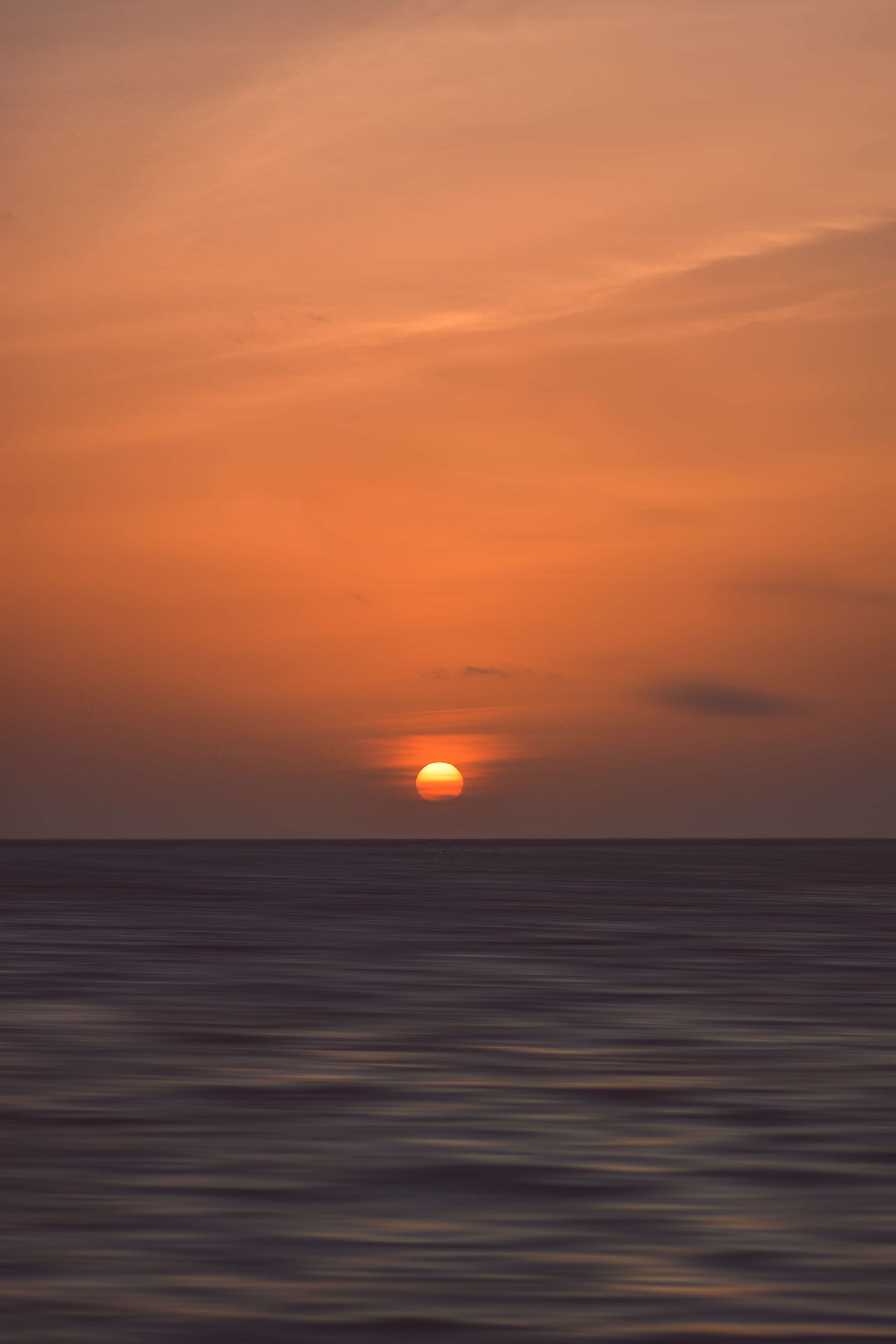 Download mobile wallpaper Smooth, Horizon, Blur, Sunset, Sea, Nature for free.