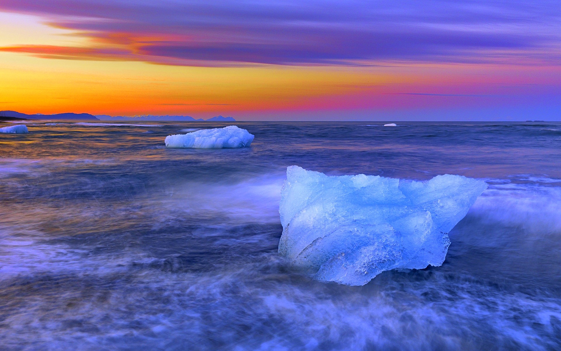 Скачать картинку Зима, Закат, Море, Снег, Горизонт, Океан, Лёд, Земля/природа в телефон бесплатно.