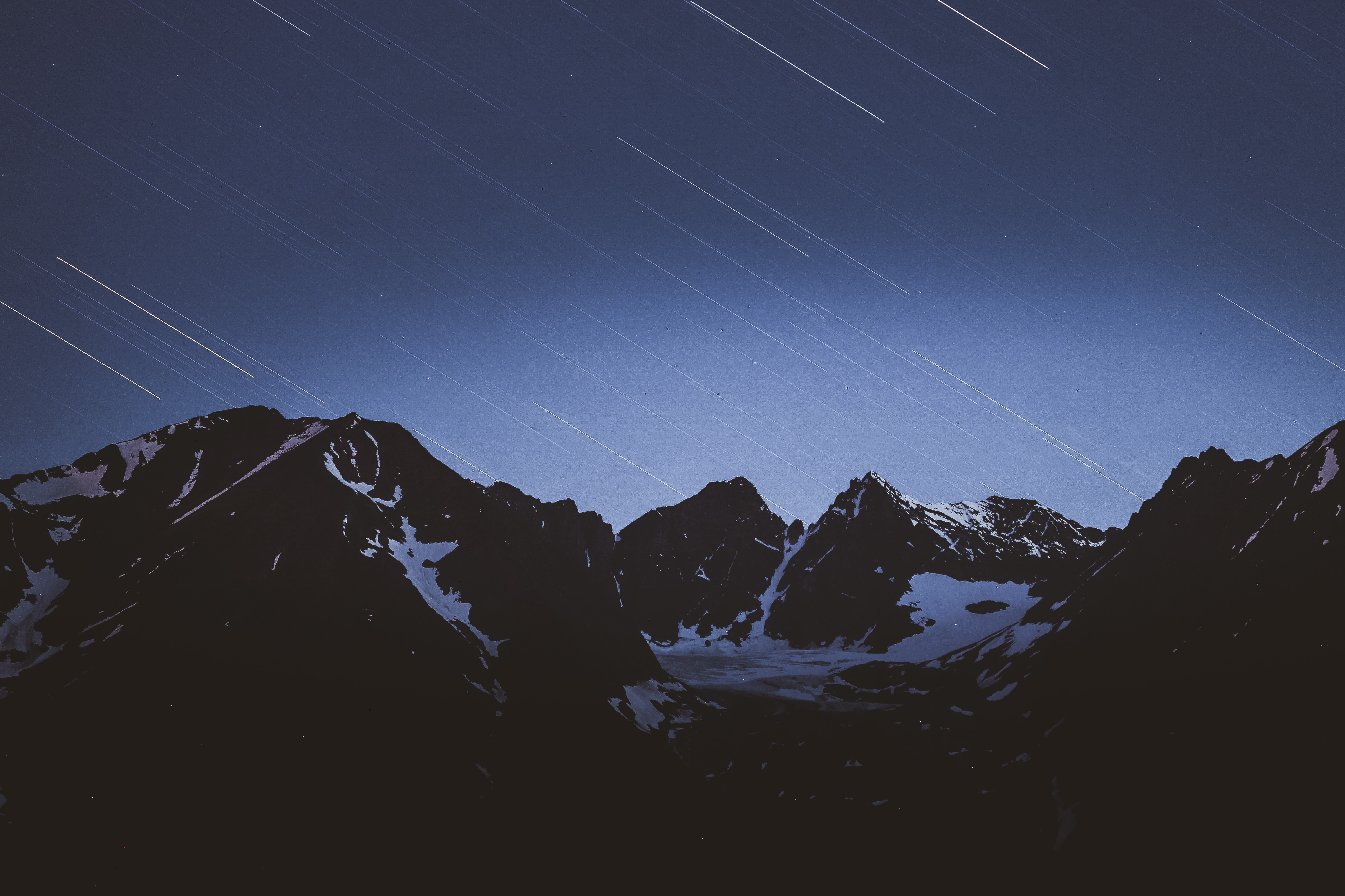 105709 descargar imagen naturaleza, montañas, estrellas, nieve, cubierto de nieve, nevado, starfall, caída de estrellas: fondos de pantalla y protectores de pantalla gratis