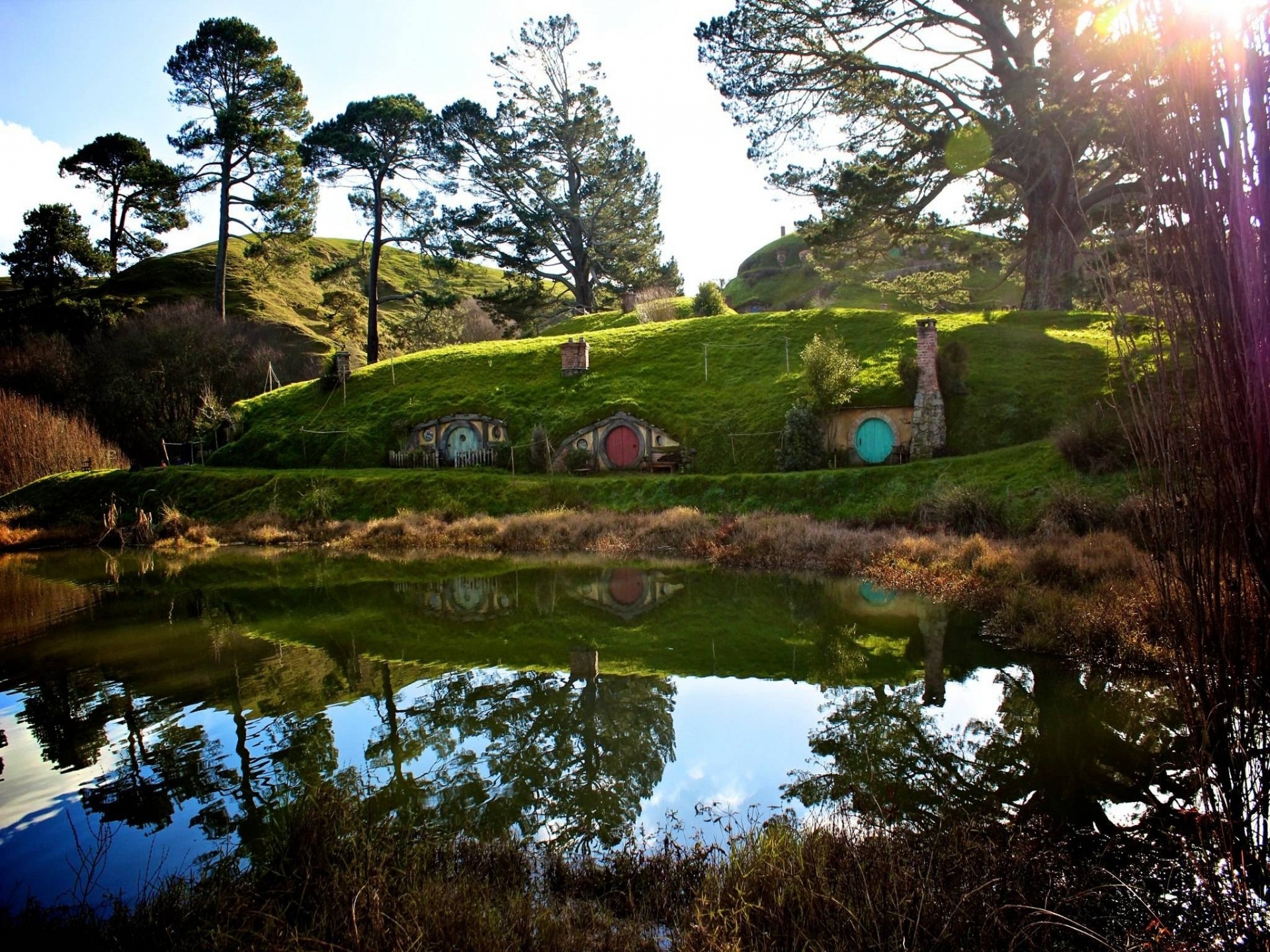 man made, hobbiton, grass, house, lake, nature, reflection, tree, water