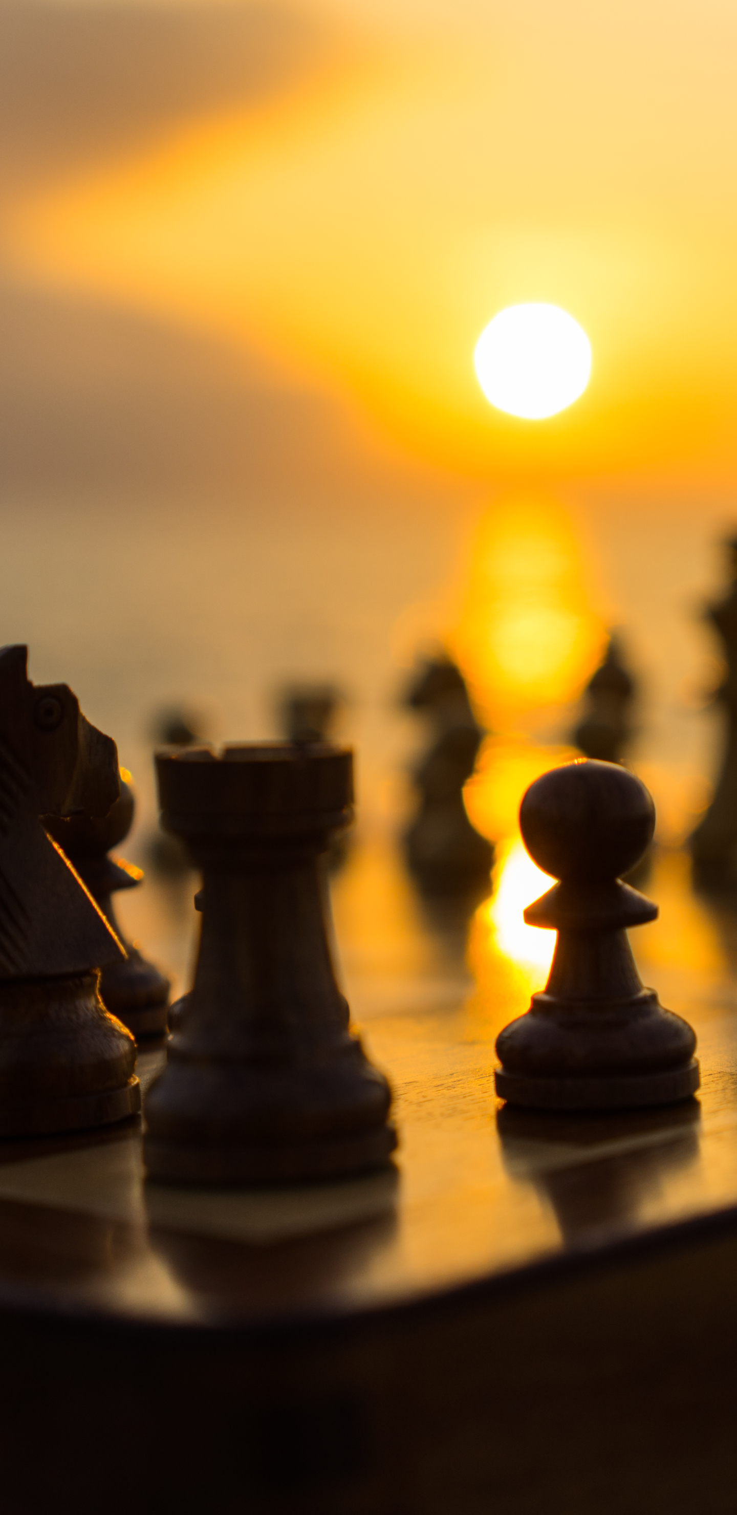 Download mobile wallpaper Sunset, Chess, Game, Depth Of Field for free.