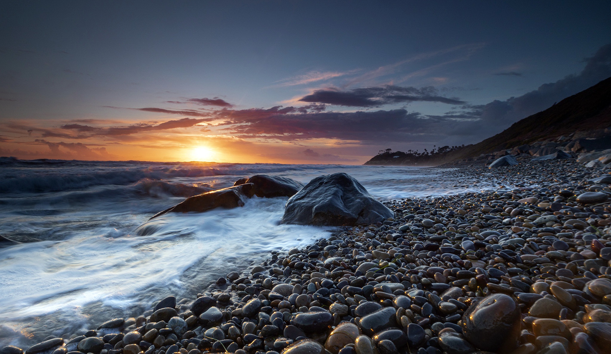 Download mobile wallpaper Sunset, Sea, Shore, Earth, Stone, Coastline for free.