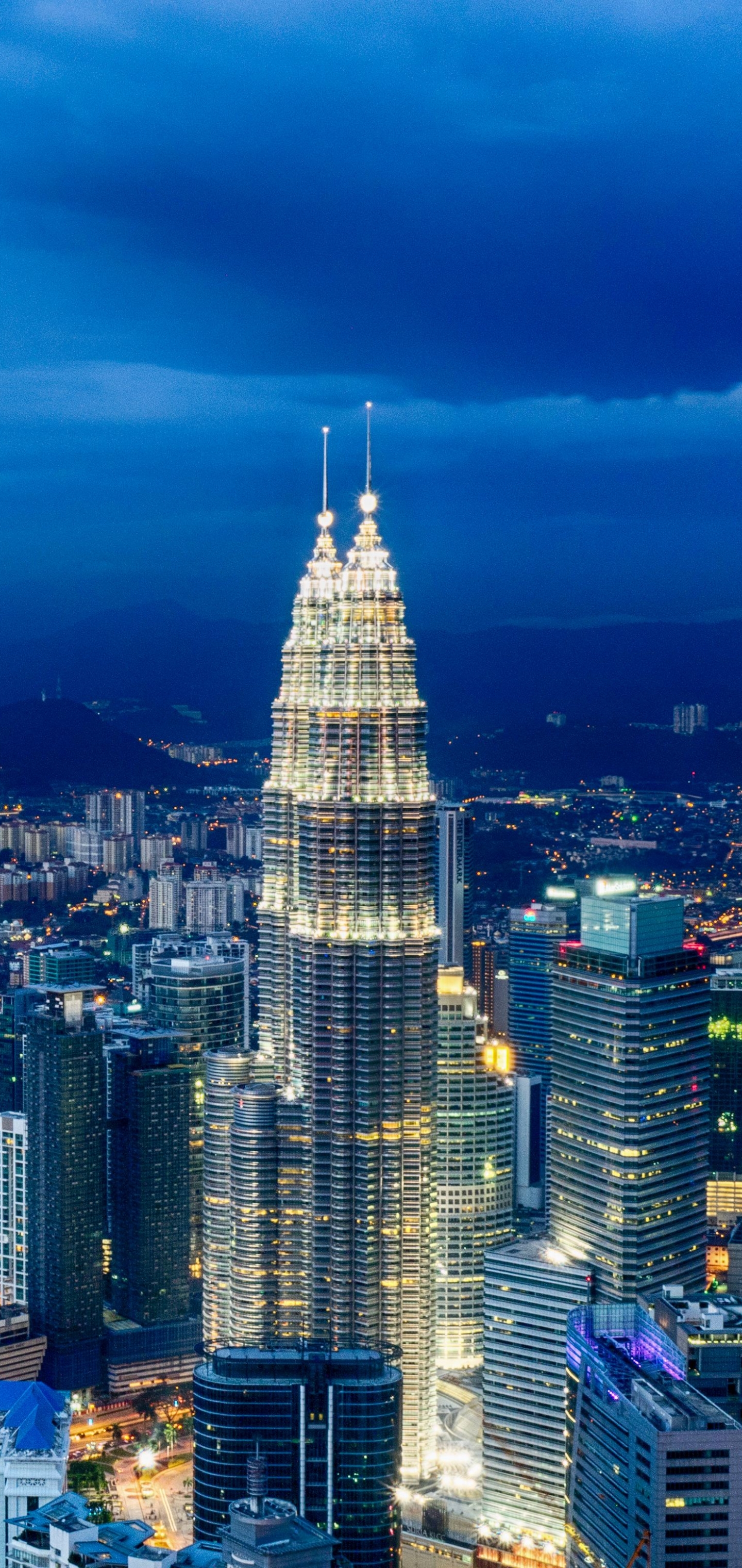Download mobile wallpaper Cities, Night, Architecture, City, Skyscraper, Building, Light, Cityscape, Kuala Lumpur, Malaysia, Metropolis, Man Made, Petronas Towers for free.