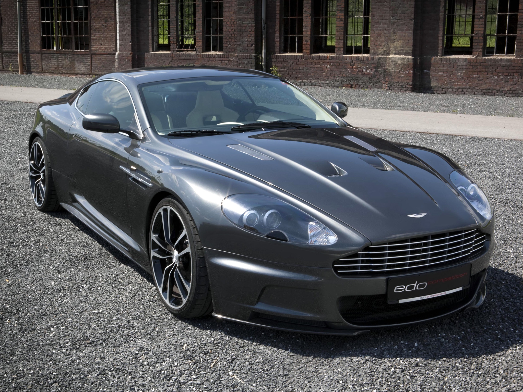 PC Wallpapers auto, aston martin, cars, front view, grey, dbs, 2010, gravel