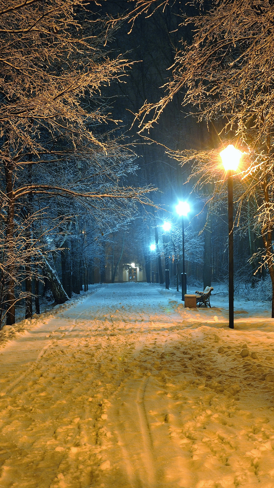 Download mobile wallpaper Winter, Night, Snow, Park, Tree, Earth, Evening, Bench, Photography, Street Light for free.