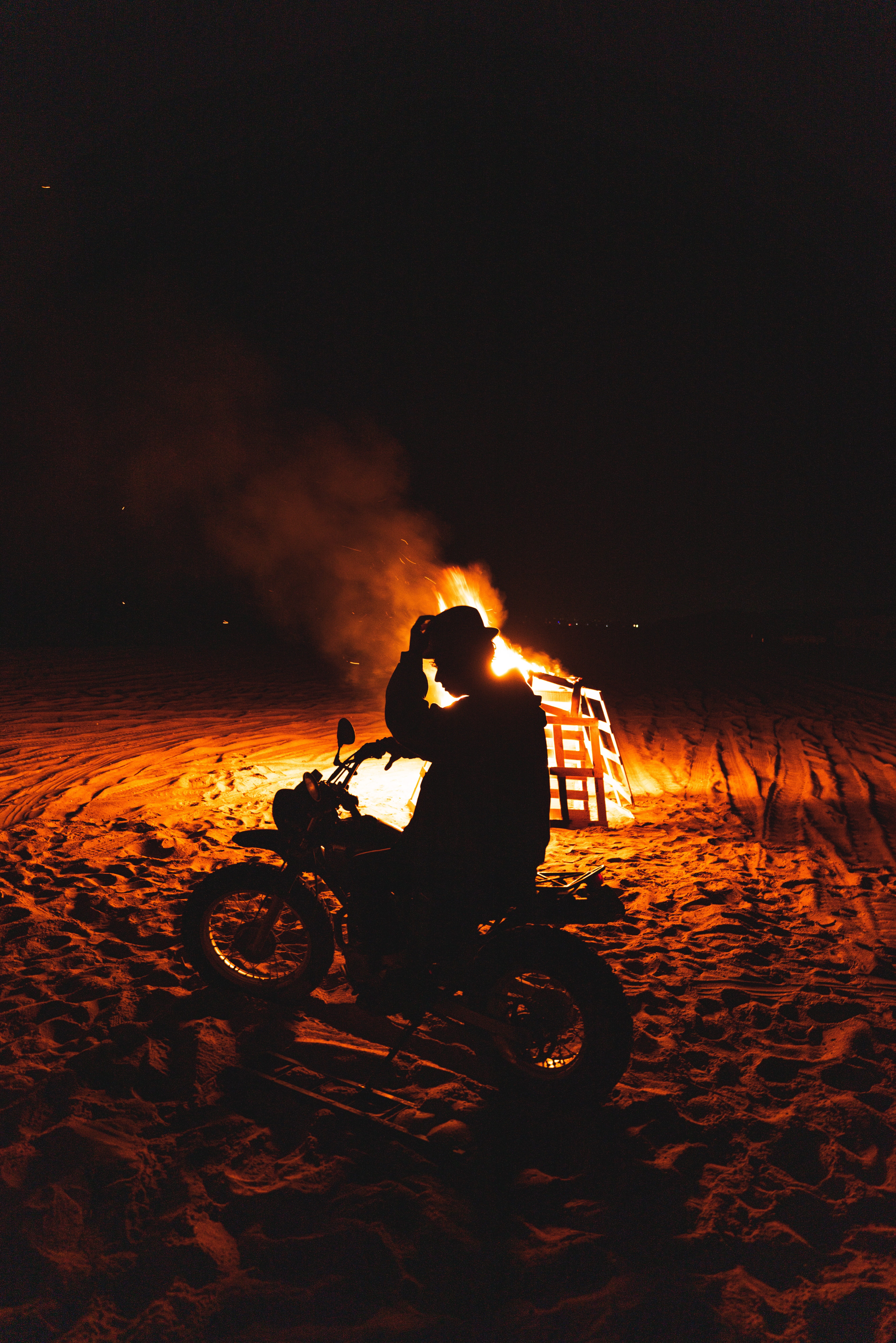 Download mobile wallpaper Flame, Fire, Silhouette, Motorcycle, Dark, Motorcyclist for free.