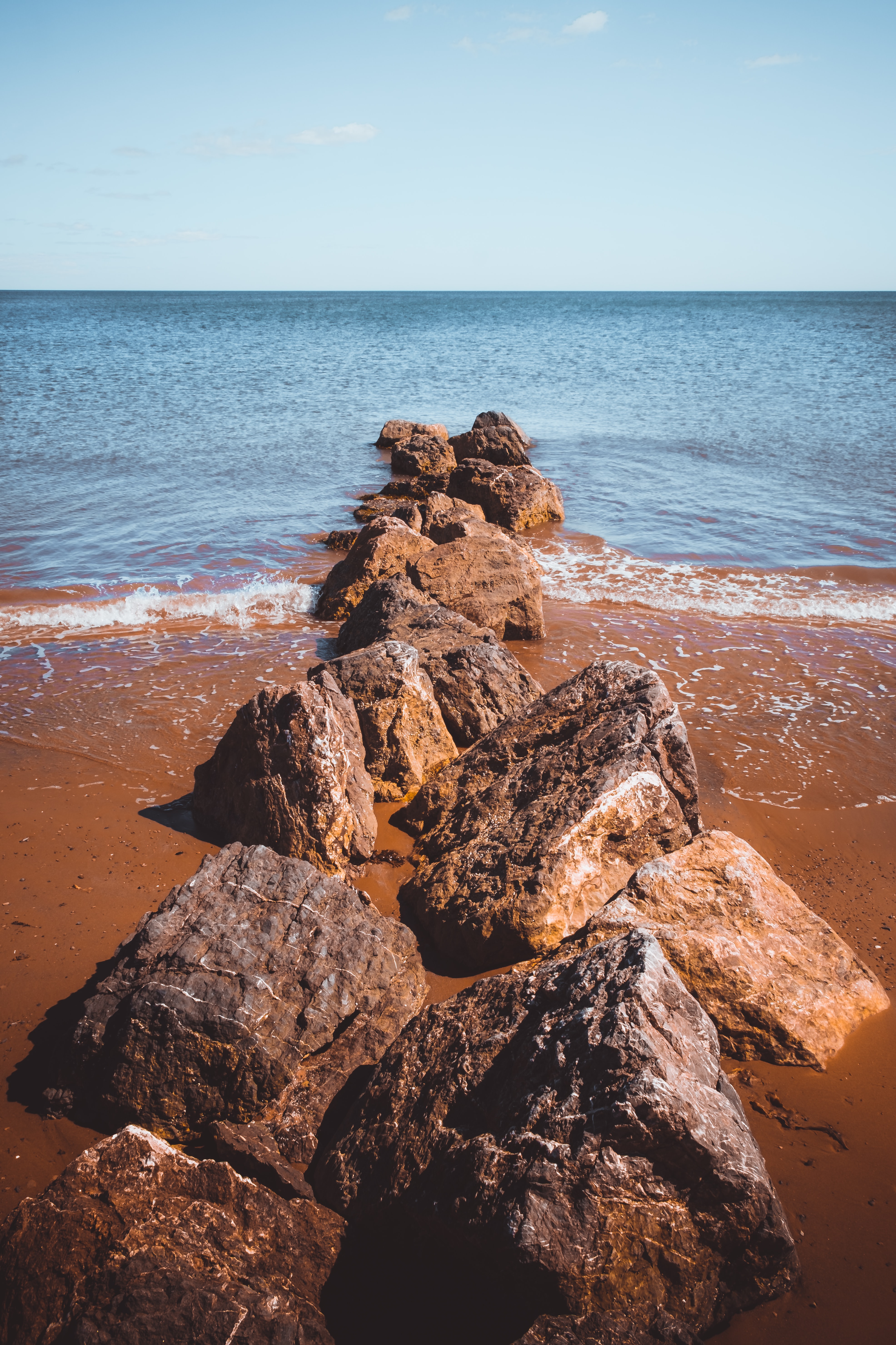 Download mobile wallpaper Stones, Water, Nature, Waves, Sea, Beach for free.