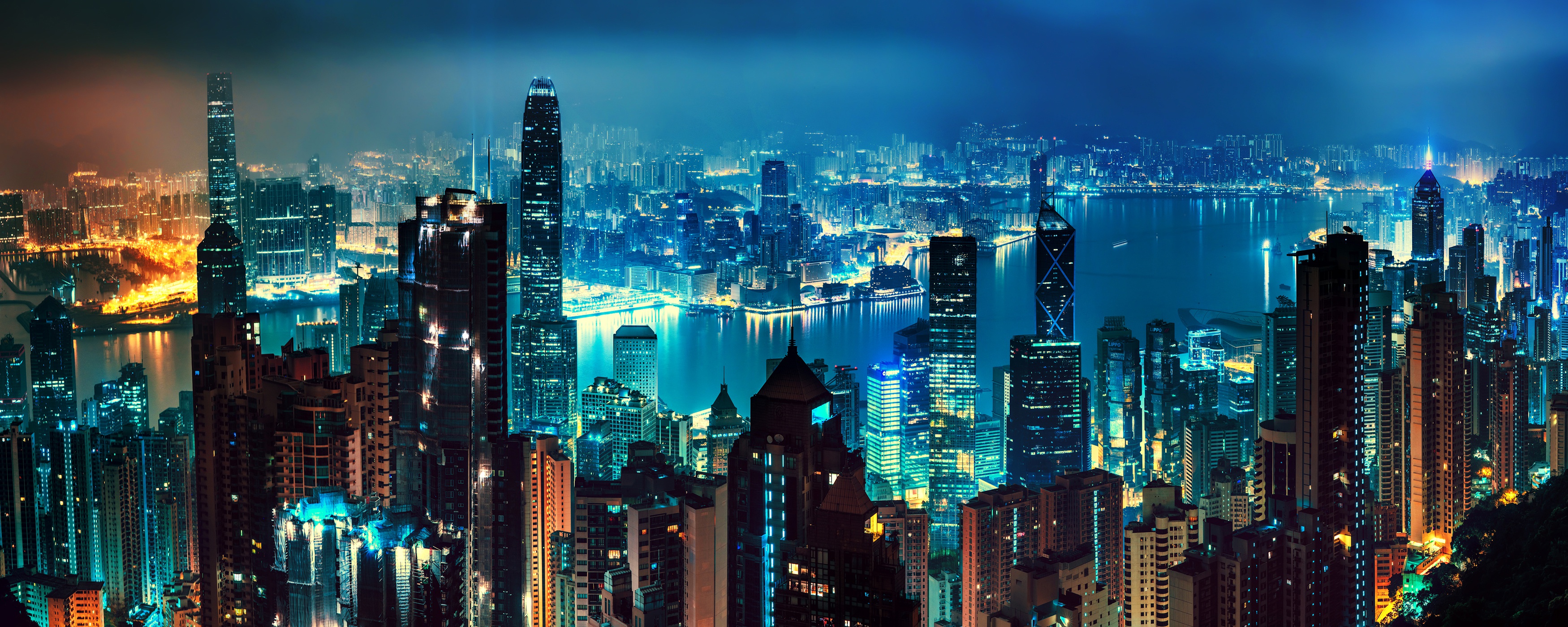 Download mobile wallpaper Cities, Night, Skyscraper, Building, Light, Panorama, Cityscape, China, River, Hong Kong, Man Made for free.