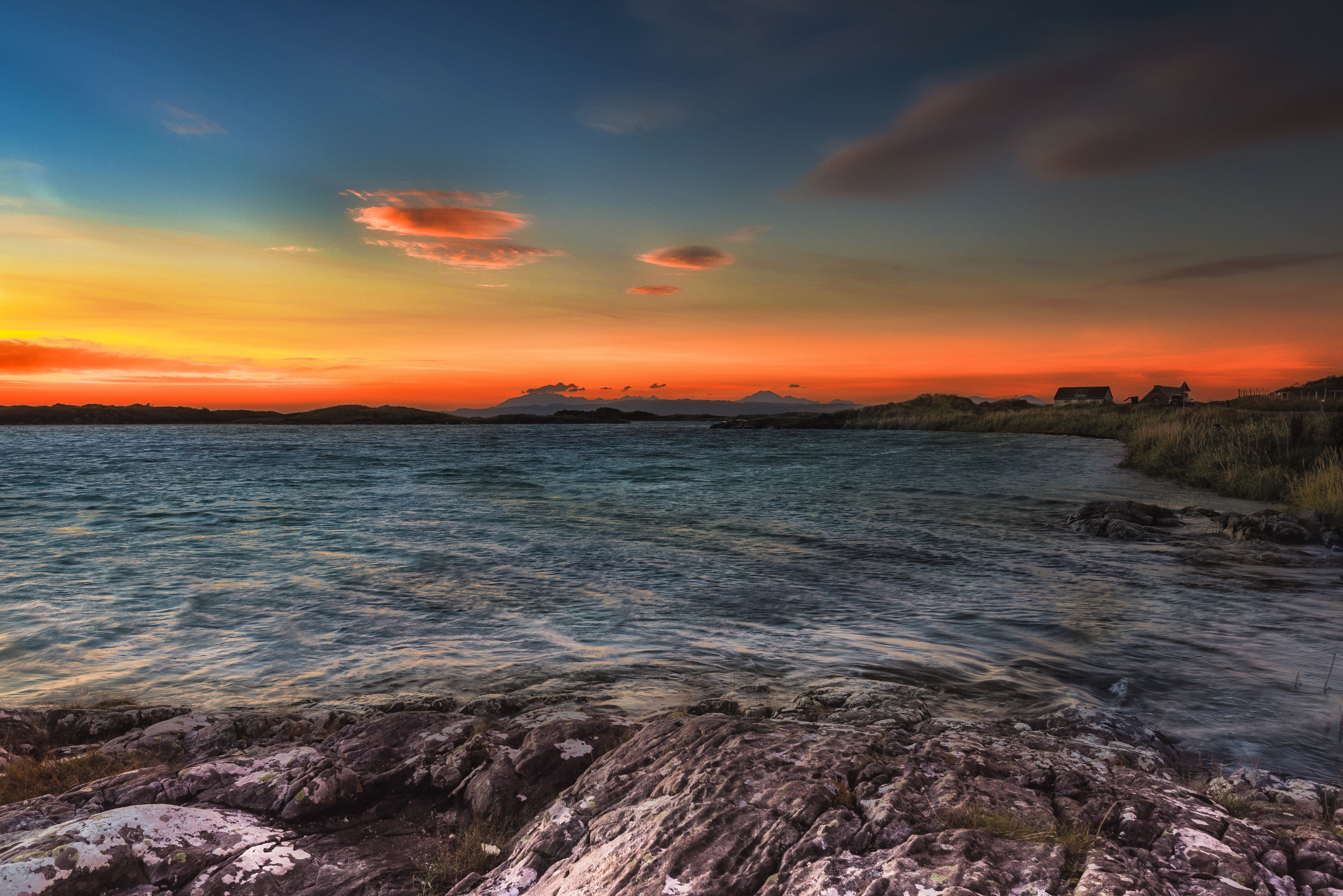 Free download wallpaper Building, Rocks, Coast, Nature, Sunset, Sea on your PC desktop