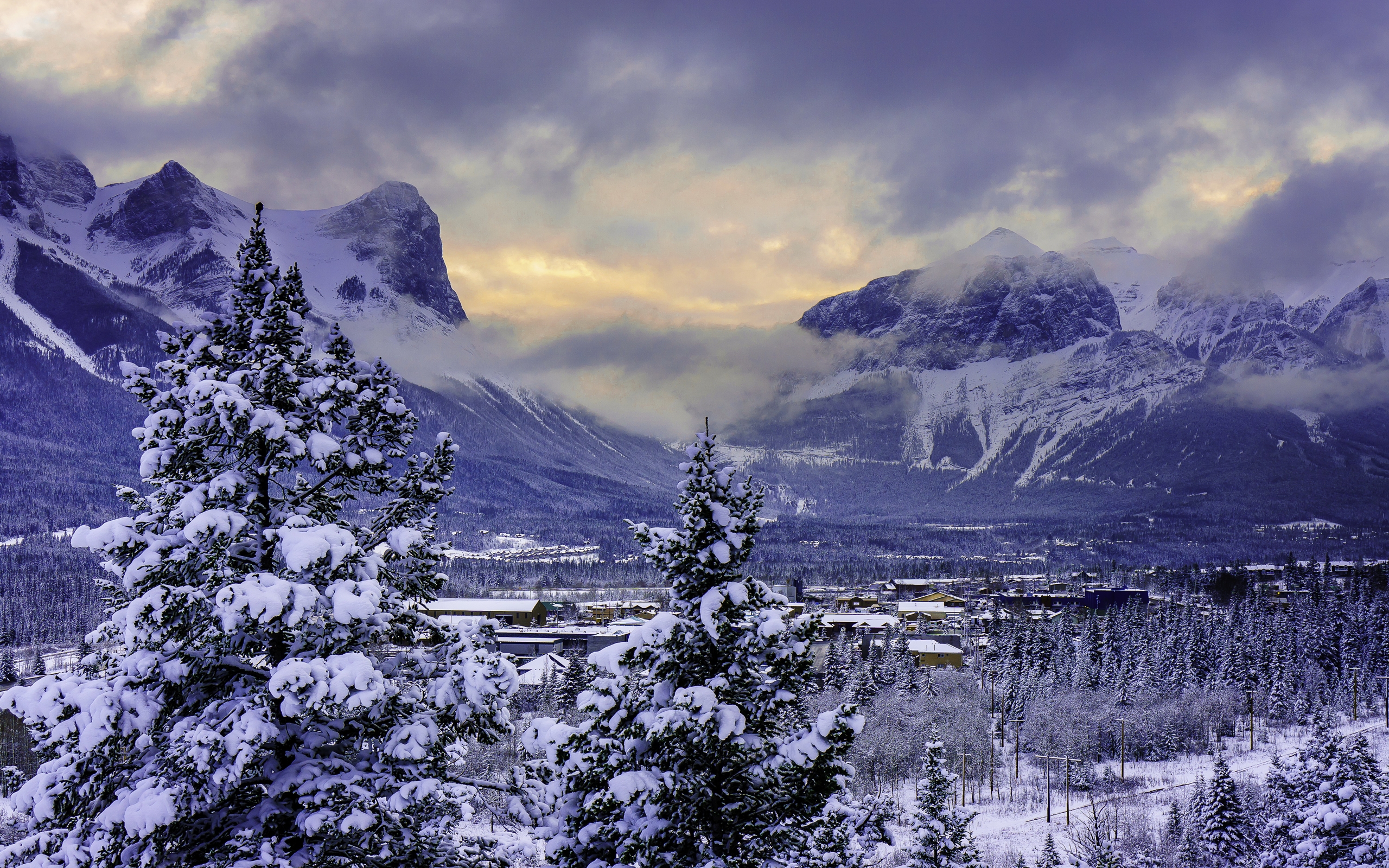 Free download wallpaper Landscape, Winter, Snow, Mountain, Canada, Tree, Village, Man Made on your PC desktop