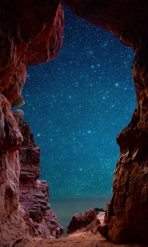 Download mobile wallpaper Sky, Stars, Night, Caves, Starry Sky, Earth, Cave for free.
