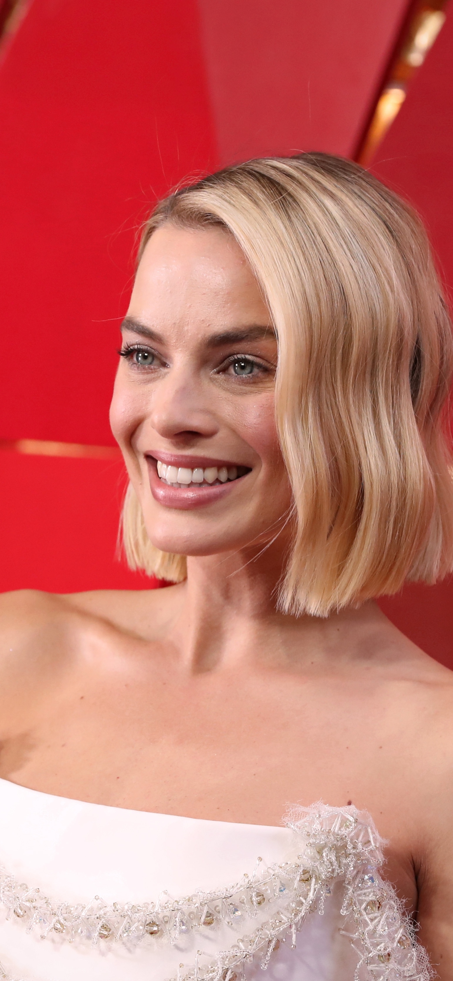 Handy-Wallpaper Lächeln, Blond, Blaue Augen, Blondinen, Berühmtheiten, Darstellerin, Australisch, Margot Robbie kostenlos herunterladen.