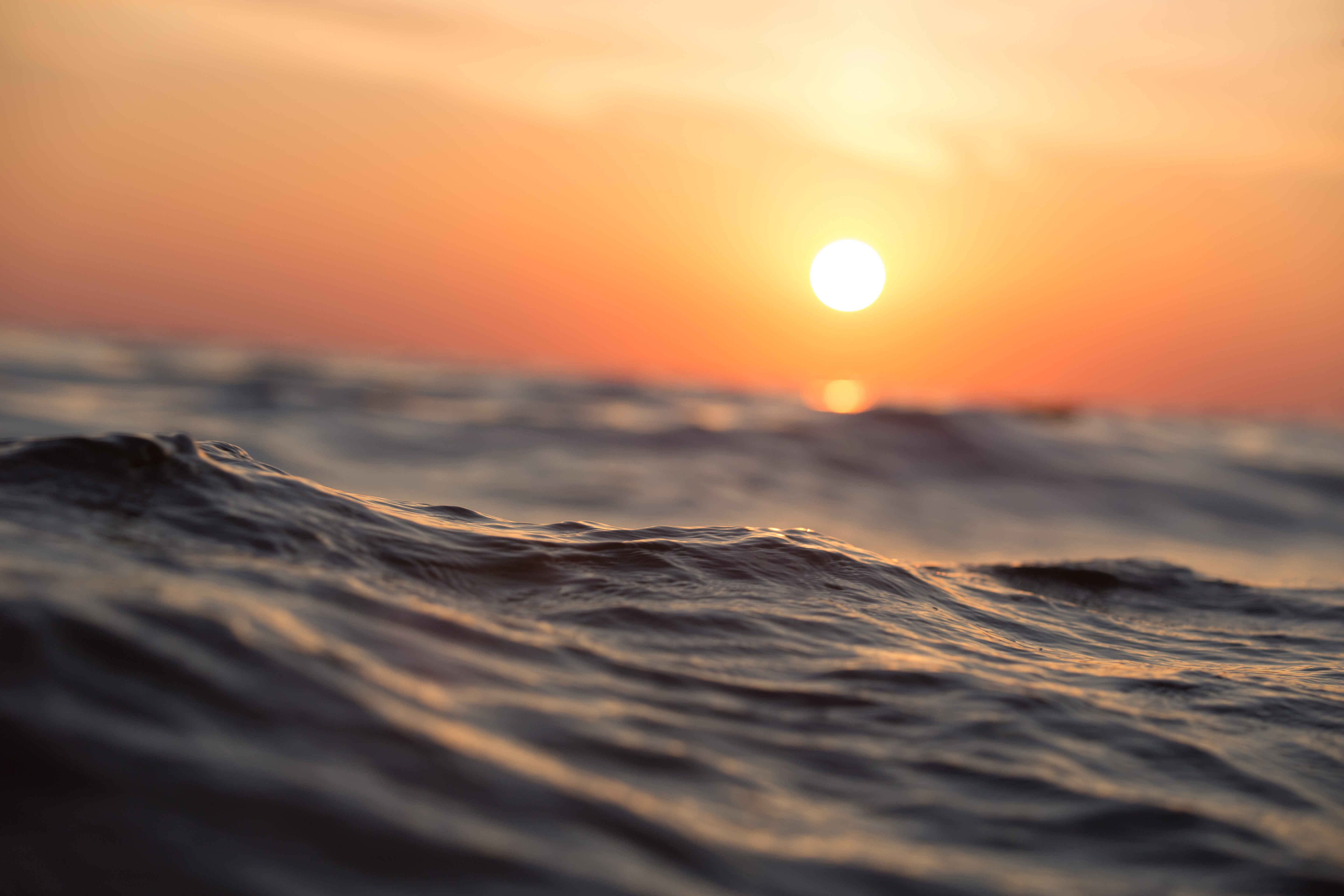 Download mobile wallpaper Water, Sunset, Sun, Close Up, Earth for free.