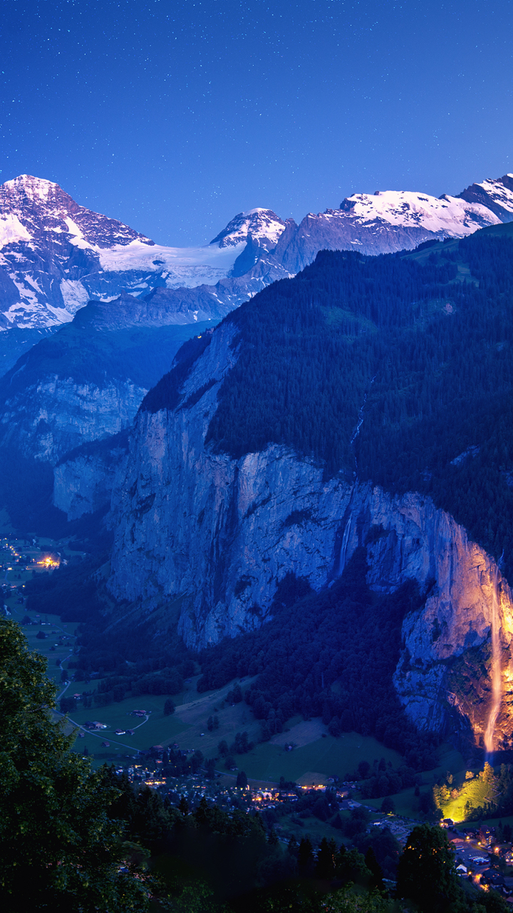 Скачать картинку Пейзаж, Ночь, Гора, Швейцария, Долина, Фотографии в телефон бесплатно.