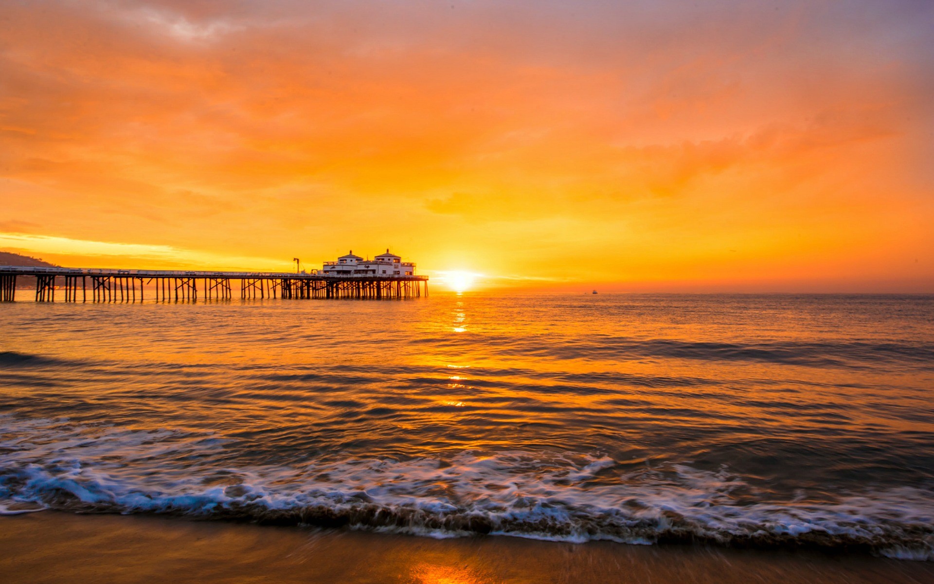 Download mobile wallpaper Sunset, Sky, Horizon, Pier, Ocean, Man Made, Orange (Color) for free.