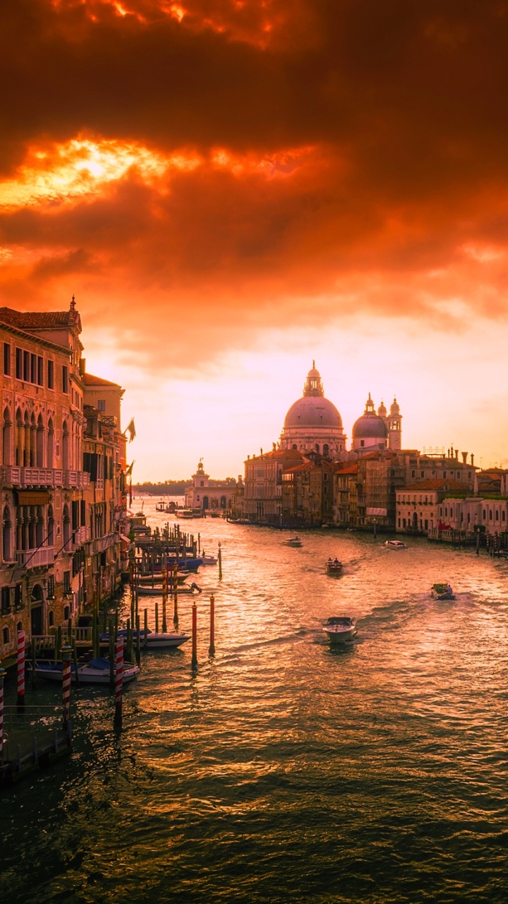 Download mobile wallpaper Cities, Sunset, Italy, Venice, City, Building, Boat, Cloud, Grand Canal, Man Made, Canal for free.