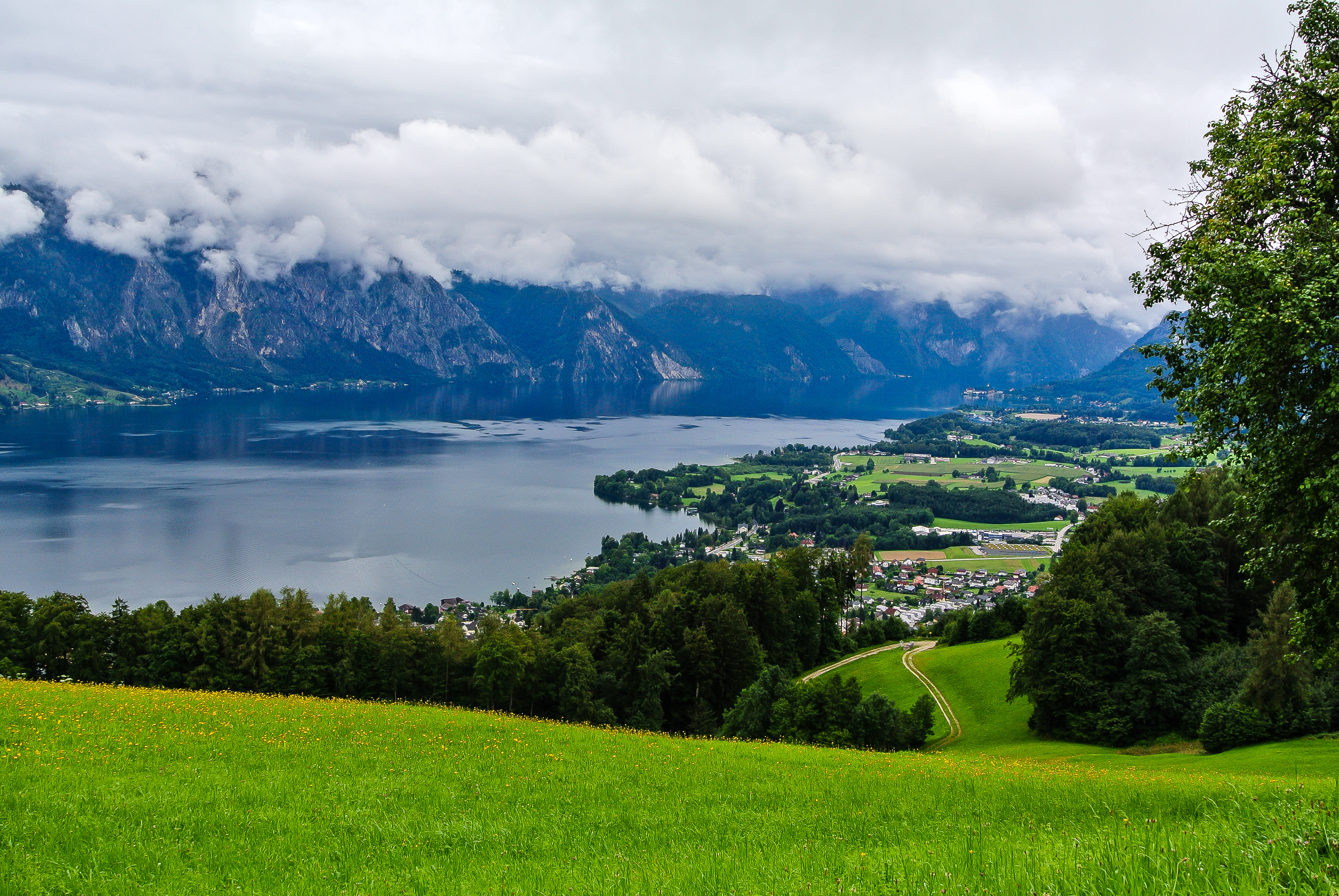 Download mobile wallpaper Lake Traunsee, Austria, Village, Lakes, Lake, Photography, Cloud, Landscape for free.