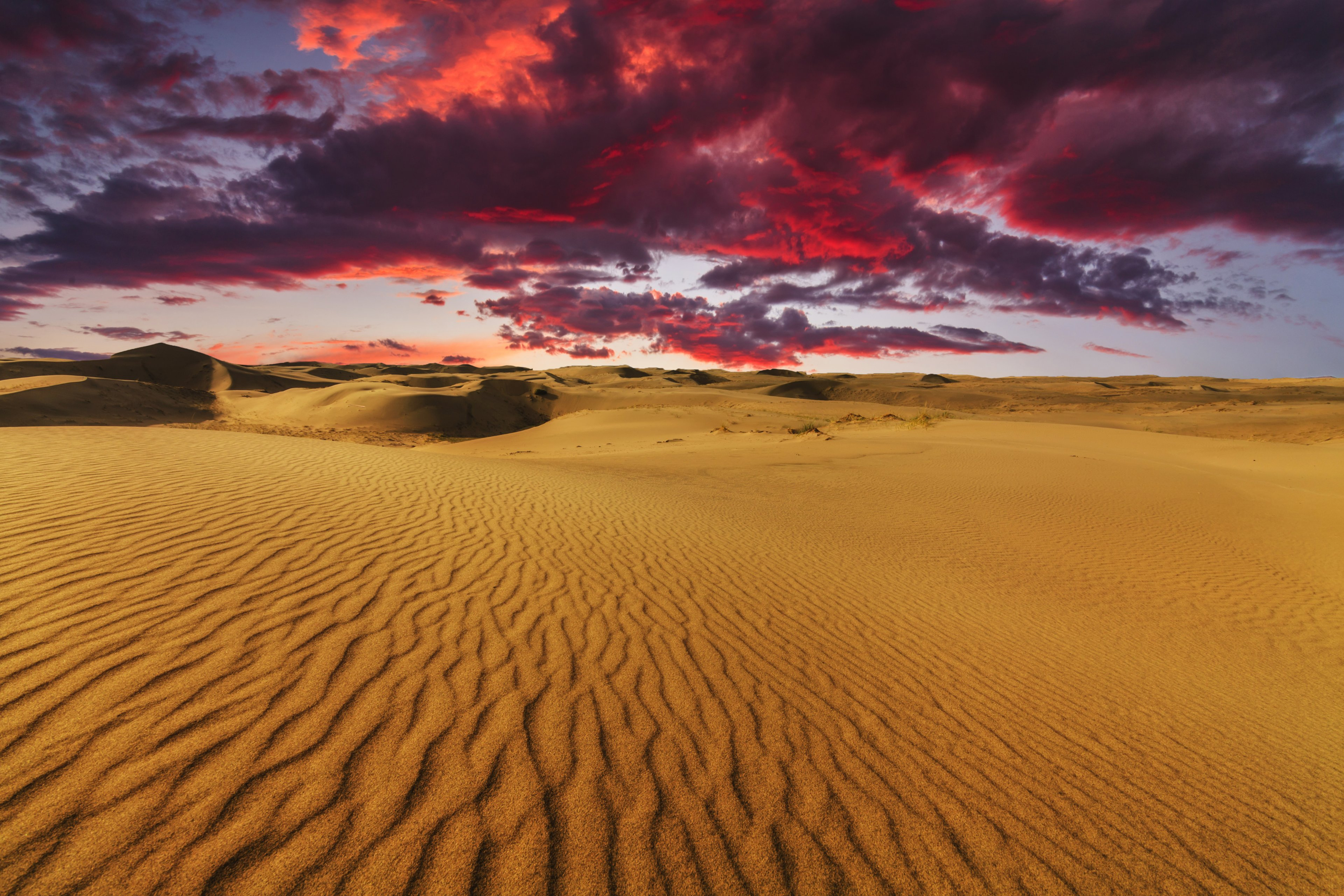 Download mobile wallpaper Sunset, Sky, Desert, Earth, Cloud, Sunbeam for free.