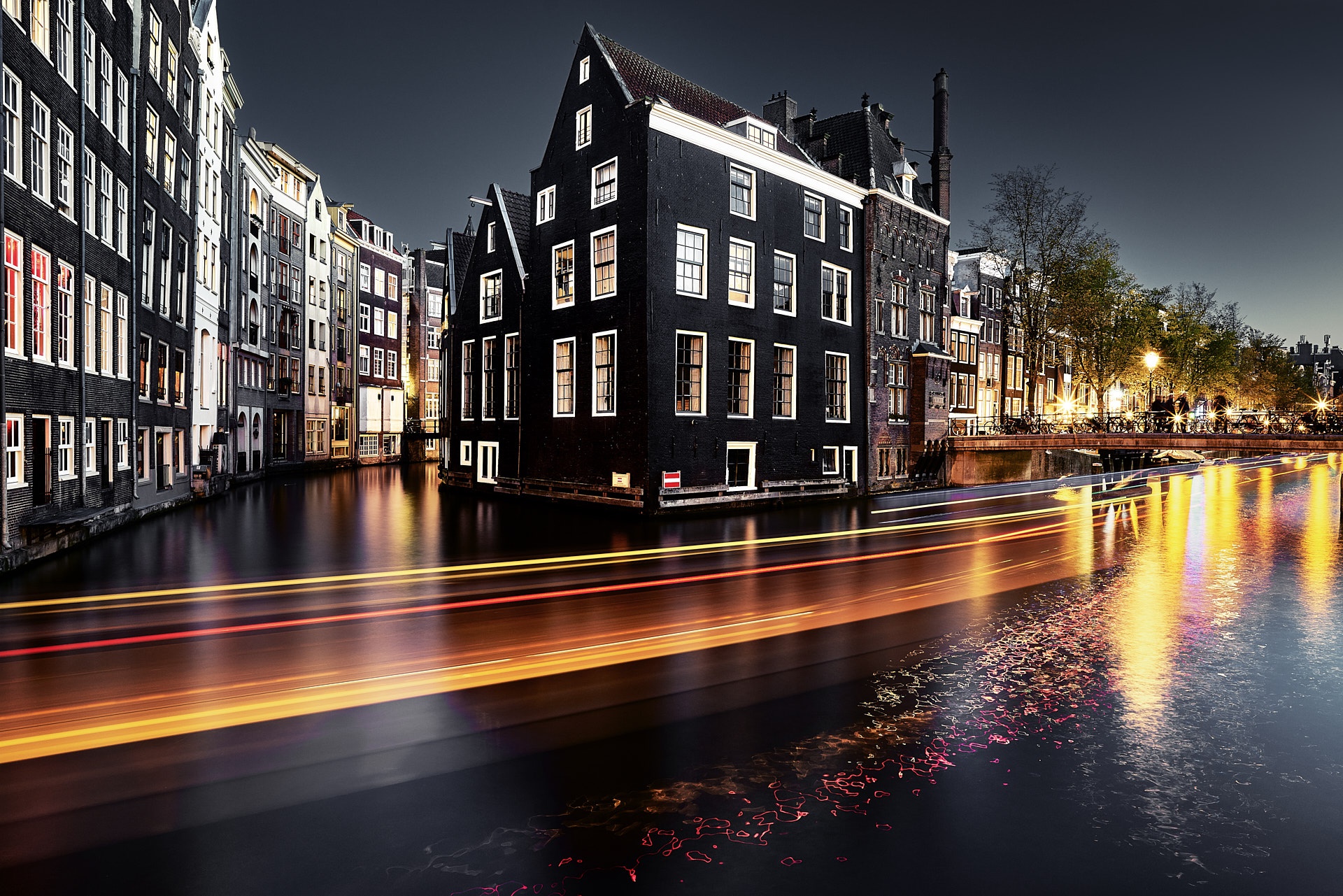 Download mobile wallpaper Cities, Night, City, Building, House, Netherlands, Amsterdam, Man Made, Time Lapse, Canal for free.
